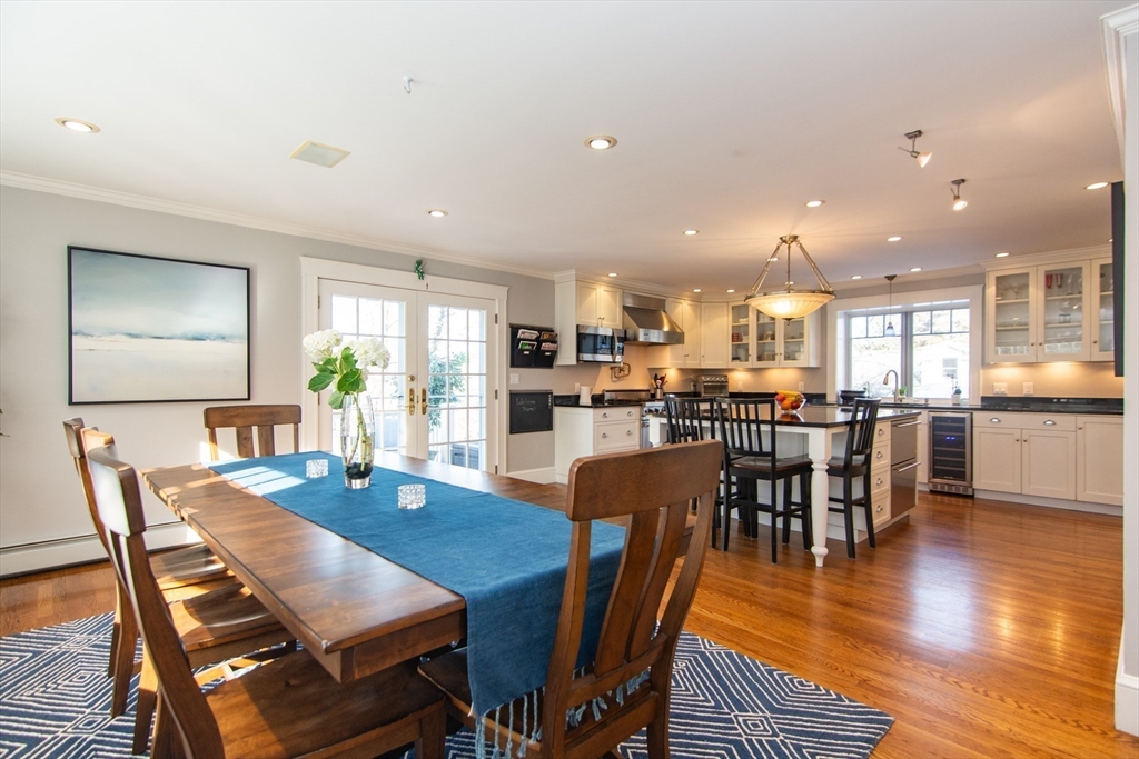 1289 Walnut Street Newton, MA 02461 - Photo 4 of 42 a view of a dining room with furniture window and wooden floor