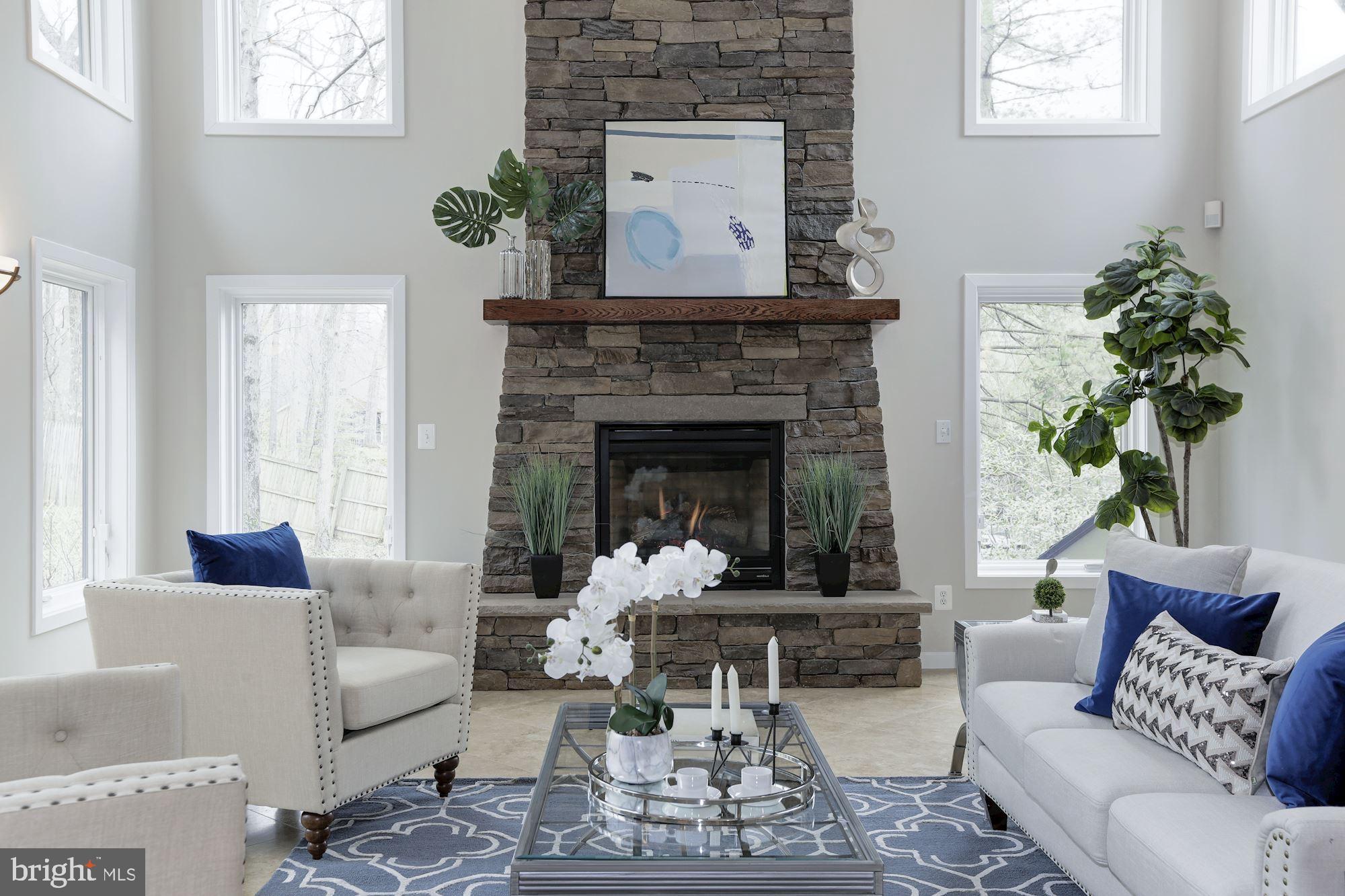 8707 Burning Tree Road Bethesda, MD 20817 - Photo 20 of 69 Stone surround gas fireplace