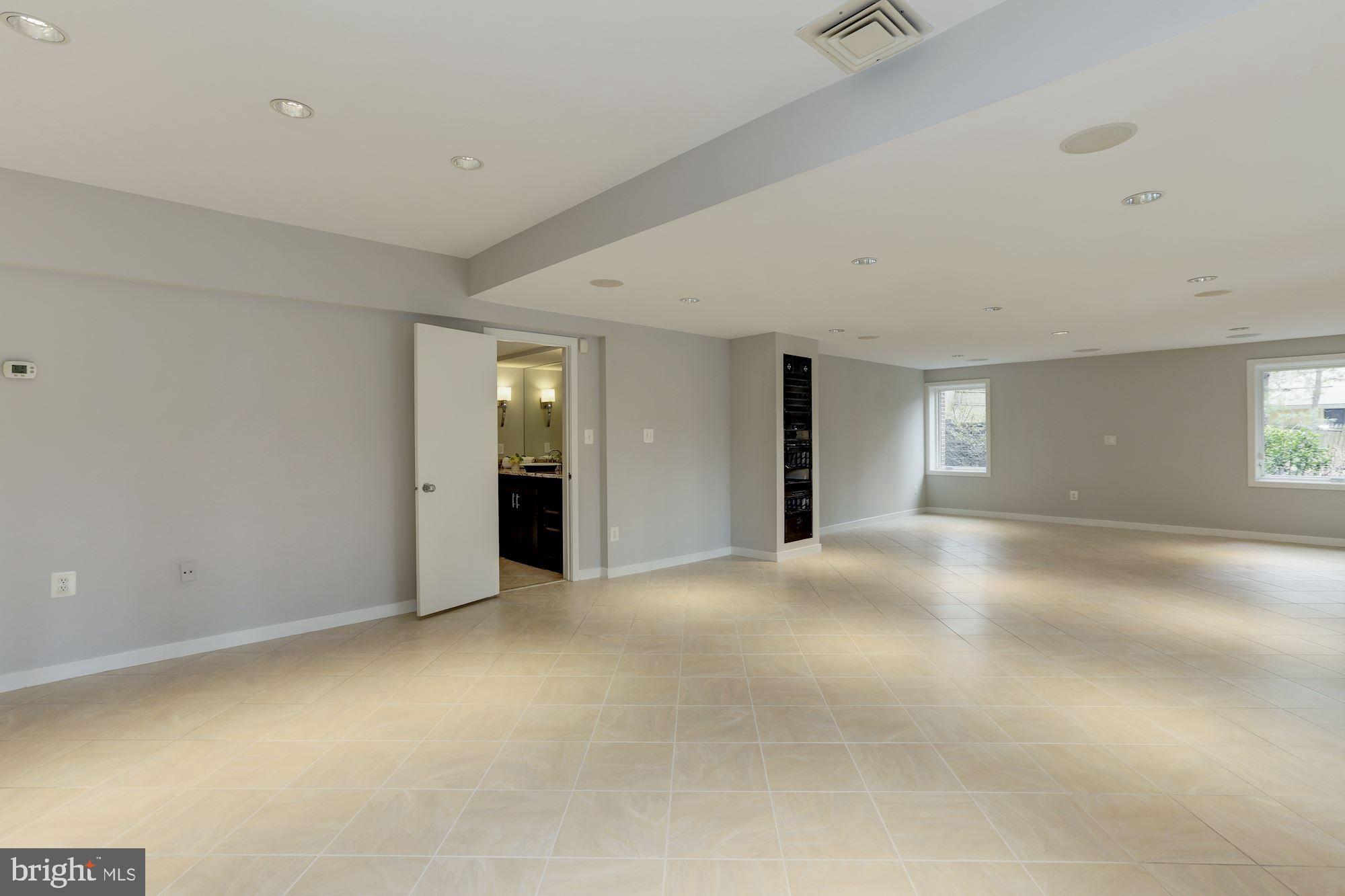 8707 Burning Tree Road Bethesda, MD 20817 - Photo 52 of 69 Huge (!) lower level recreation room