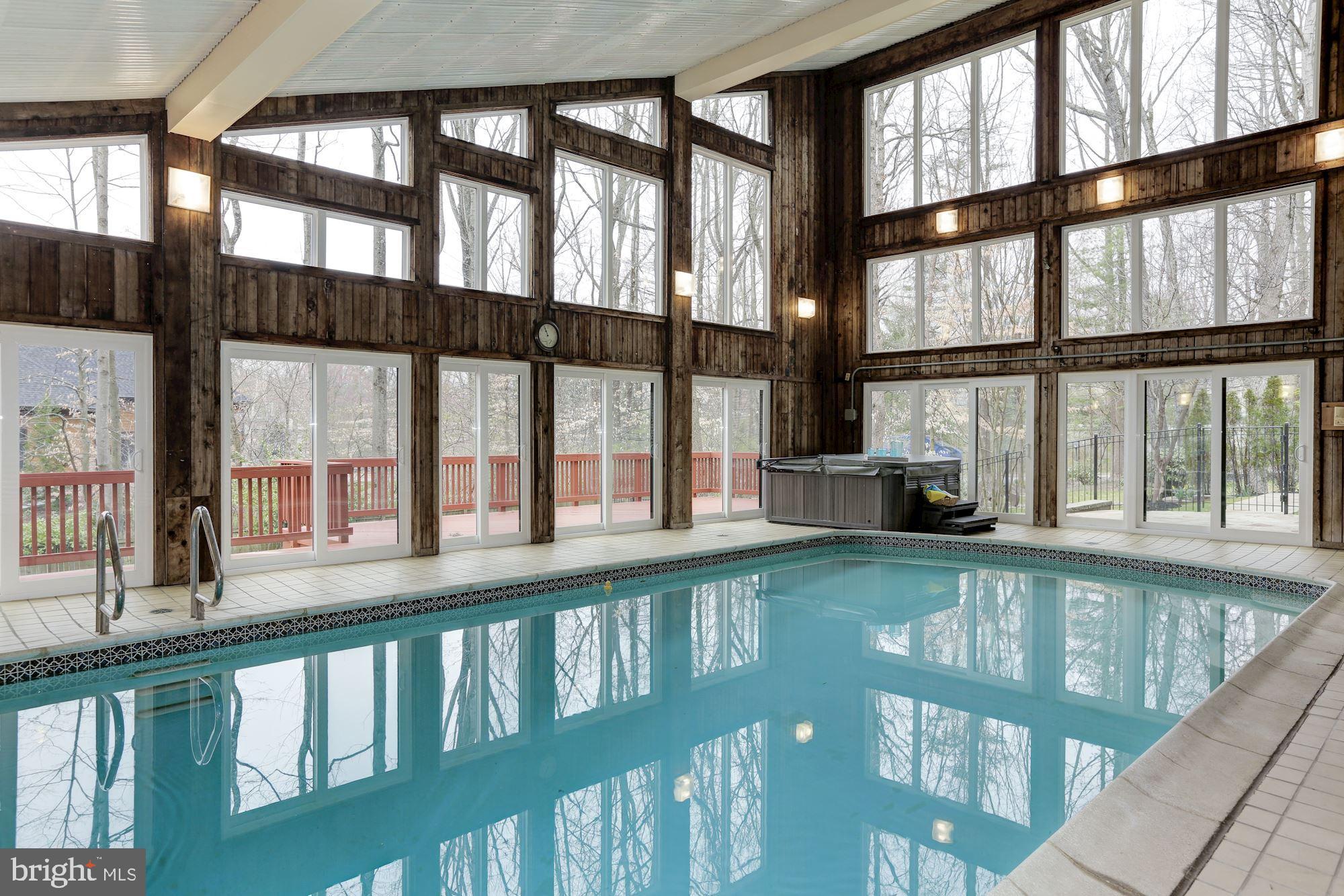 8707 Burning Tree Road Bethesda, MD 20817 - Photo 55 of 69 Indoor heated 30 x 16 ft swimming pool and hot tub