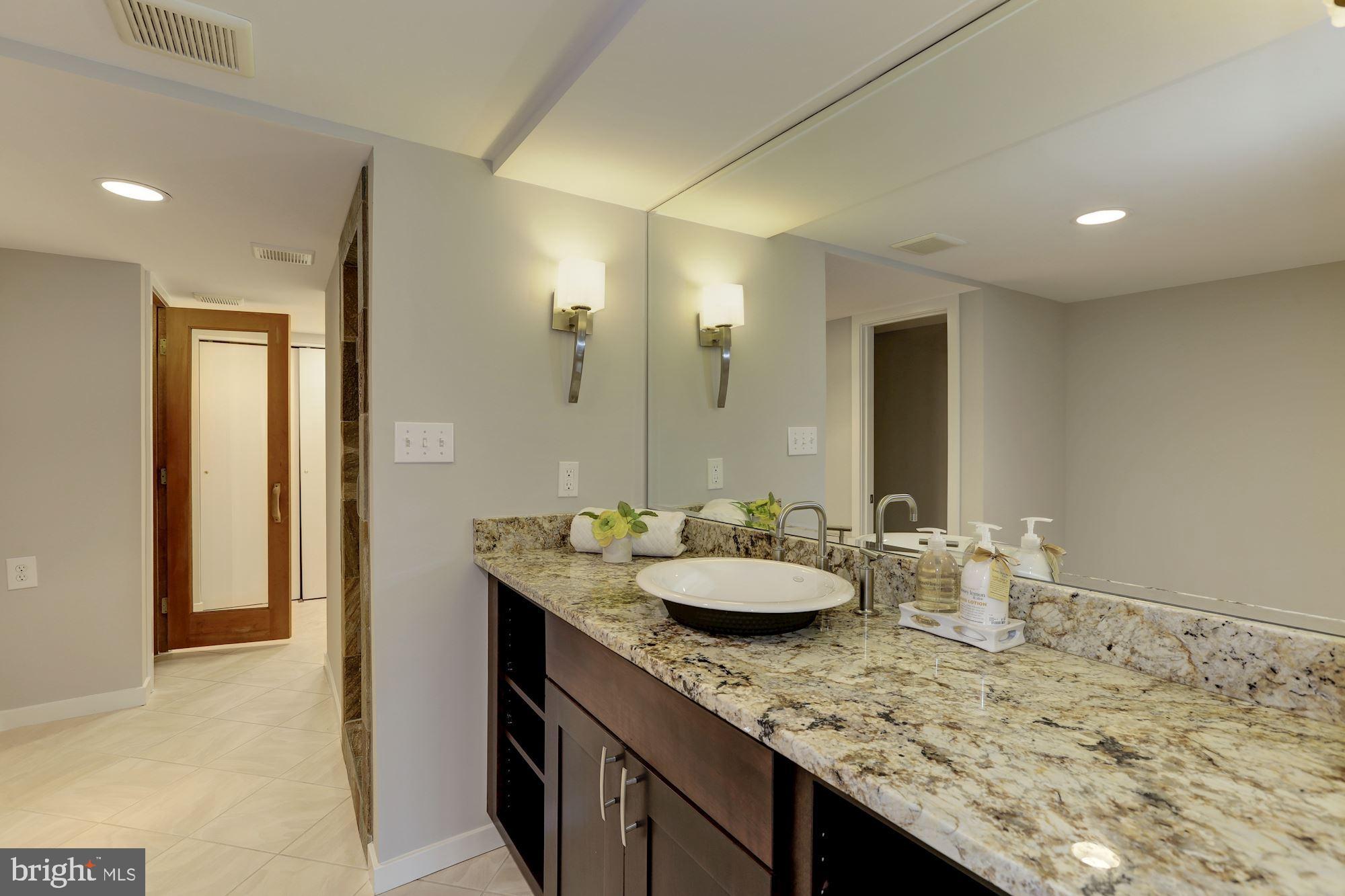 8707 Burning Tree Road Bethesda, MD 20817 - Photo 57 of 69 Pool bath with steam shower and sauna