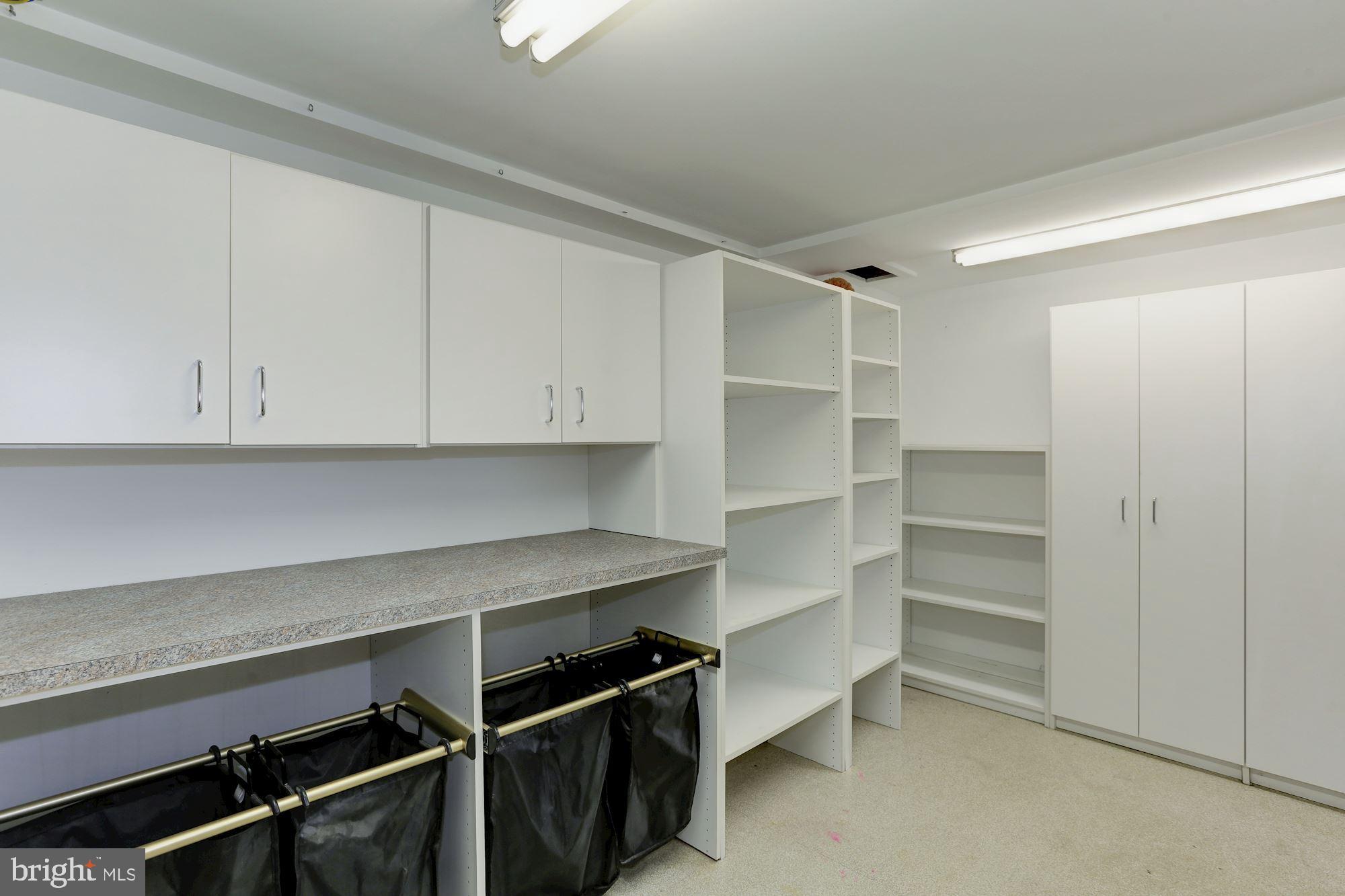 8707 Burning Tree Road Bethesda, MD 20817 - Photo 63 of 69 Built-ins for storage in the laundry room