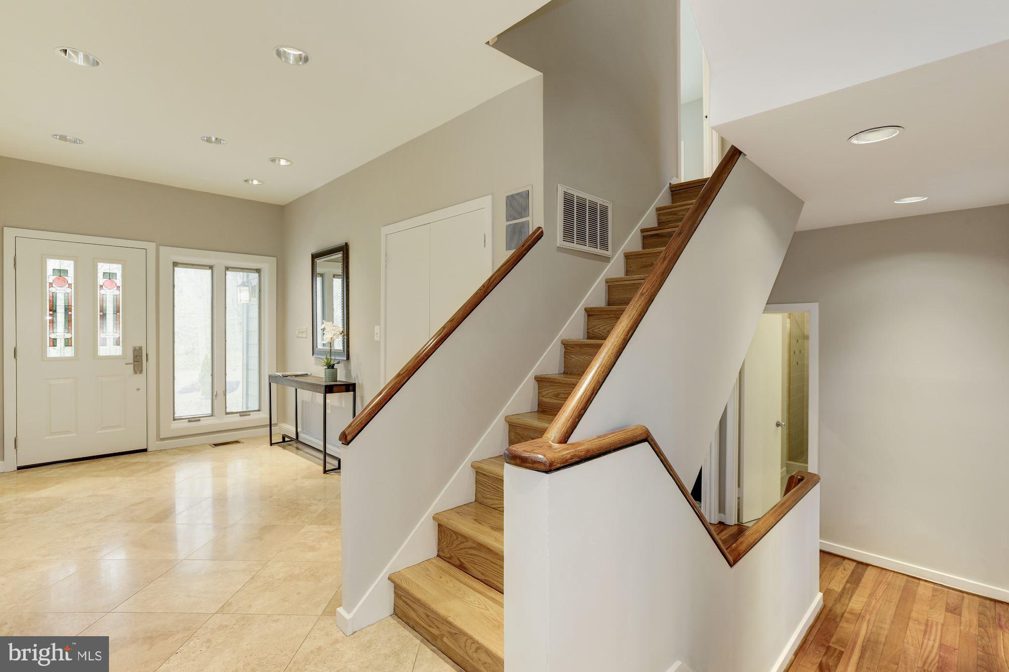 8707 Burning Tree Road Bethesda, MD 20817 - Photo 10 of 69 Open dramatic stairway