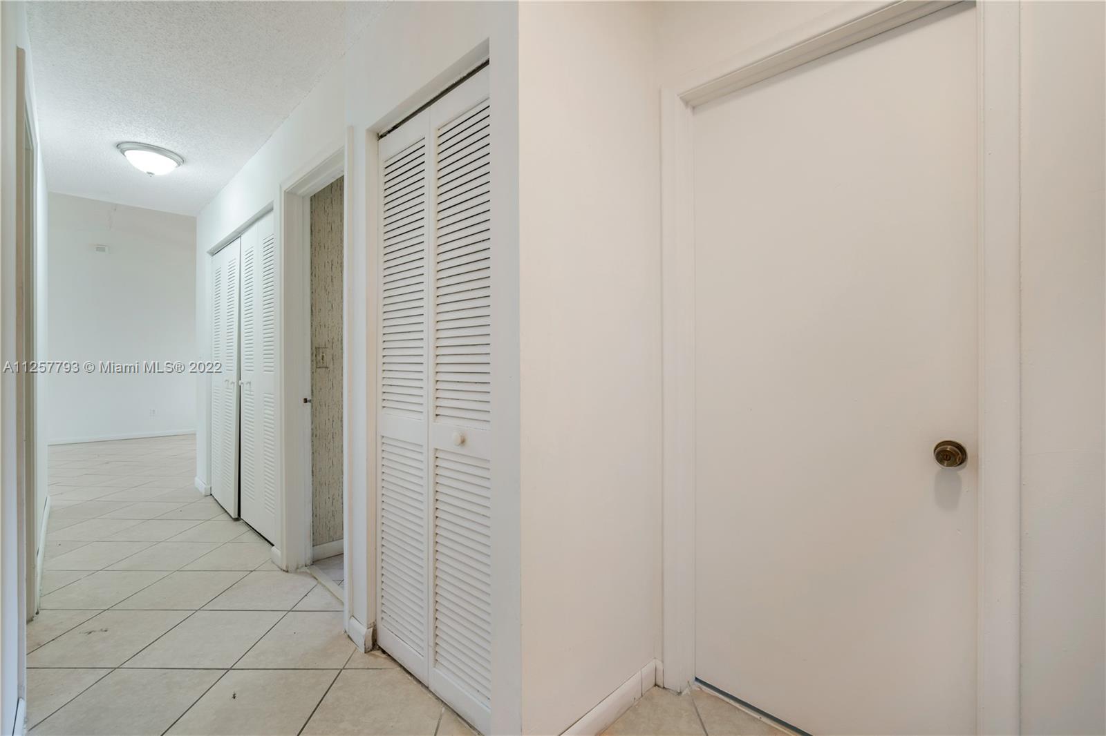 14121 Southwest 47th Street Miami, FL 33175 - Photo 12 of 45 a view of a hallway