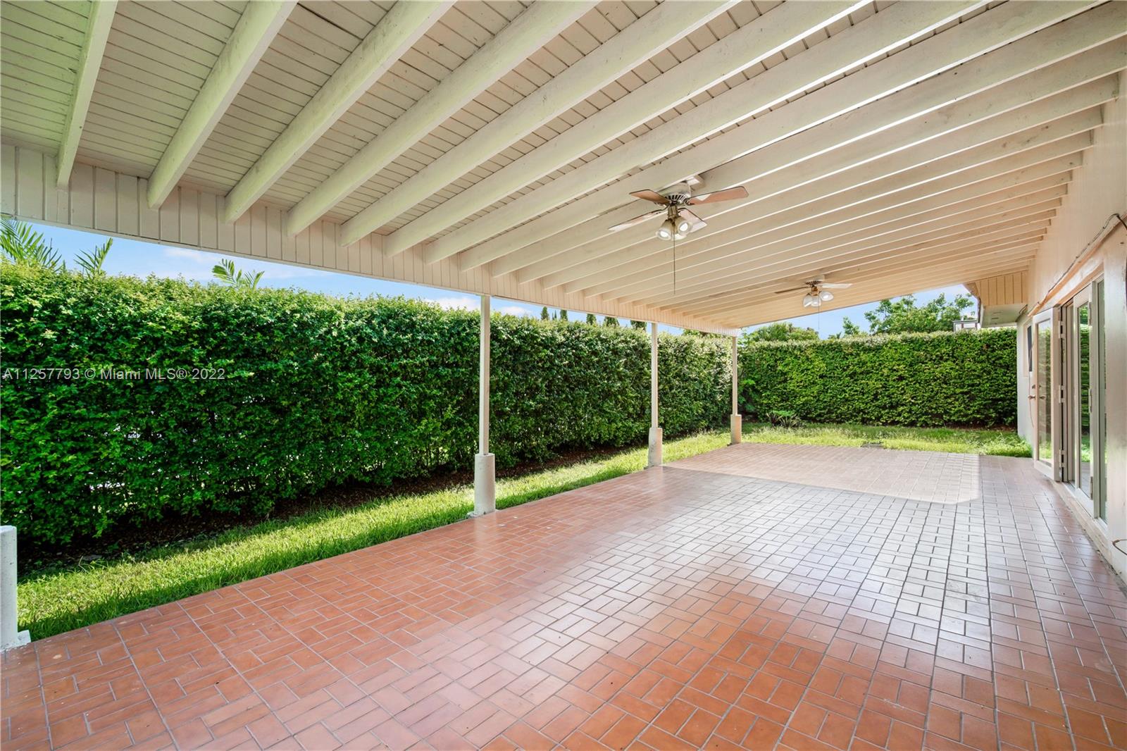 14121 Southwest 47th Street Miami, FL 33175 - Photo 18 of 45 a view of a backyard with potted plants