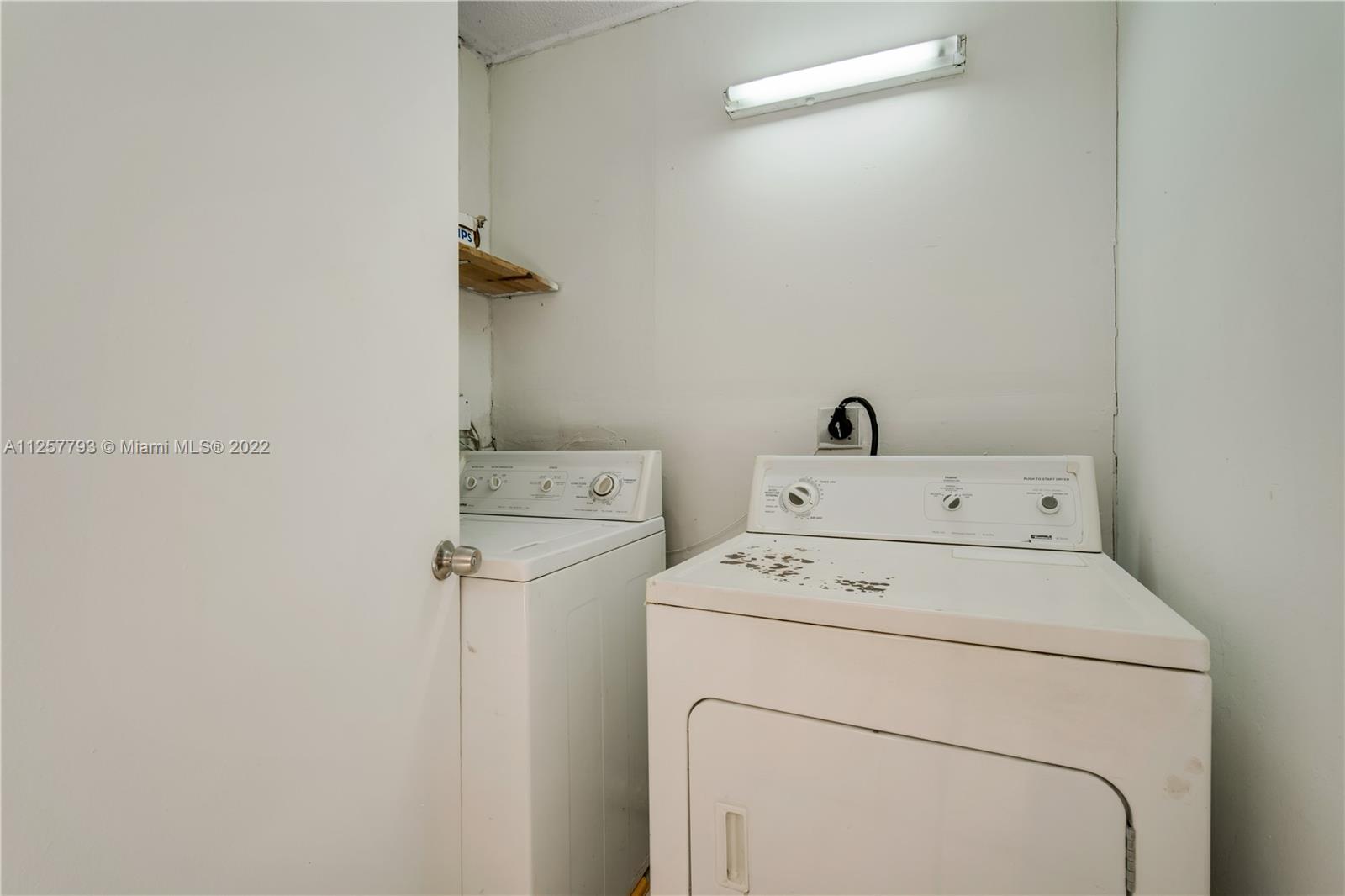 14121 Southwest 47th Street Miami, FL 33175 - Photo 25 of 45 a utility room with dryer and washer