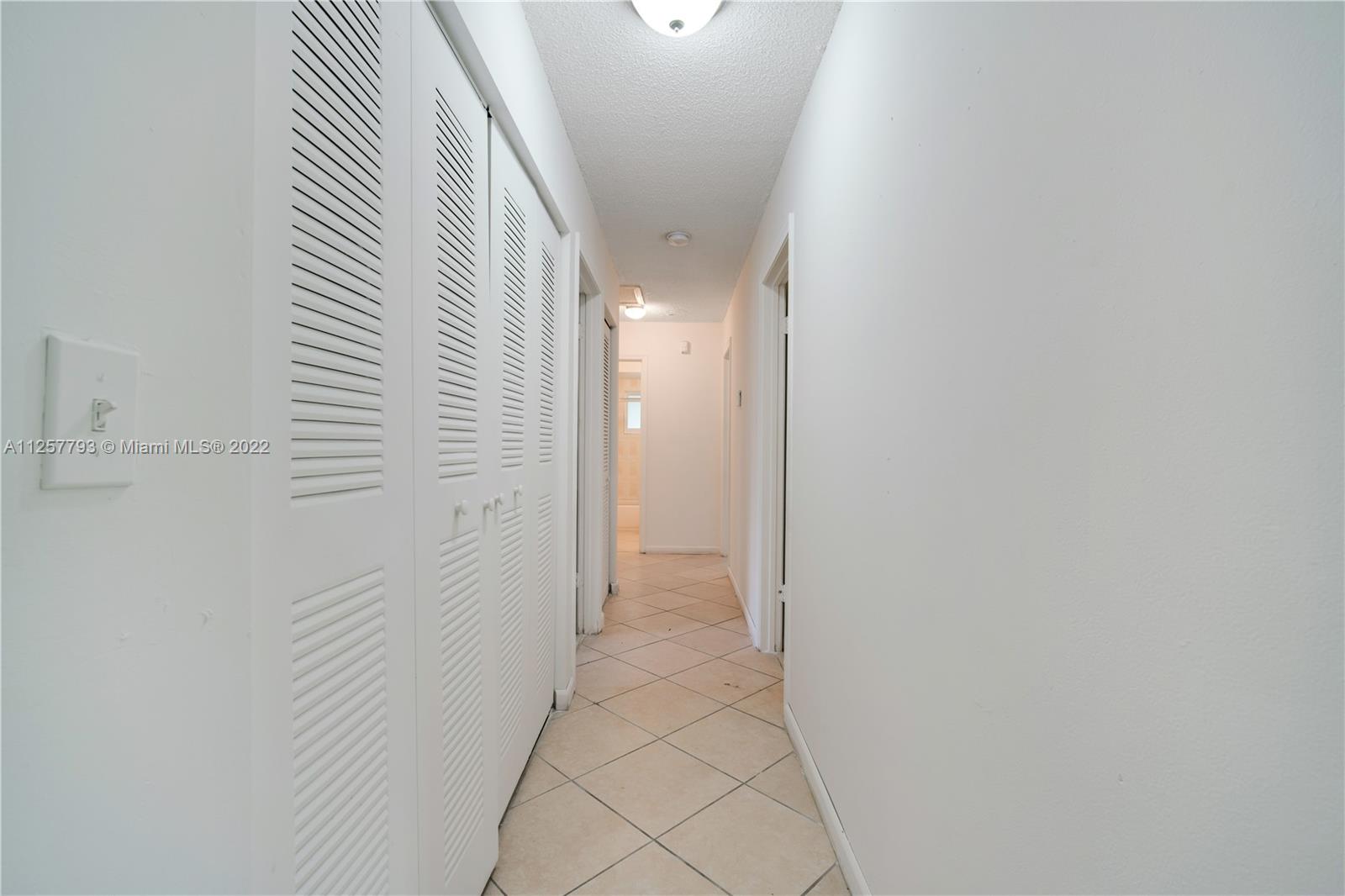 14121 Southwest 47th Street Miami, FL 33175 - Photo 30 of 45 a view of a hallway