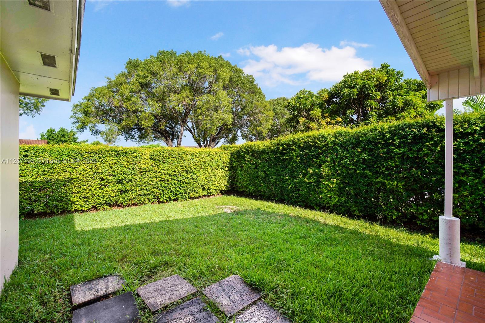 14121 Southwest 47th Street Miami, FL 33175 - Photo 36 of 45 a view of a garden with an outdoor space