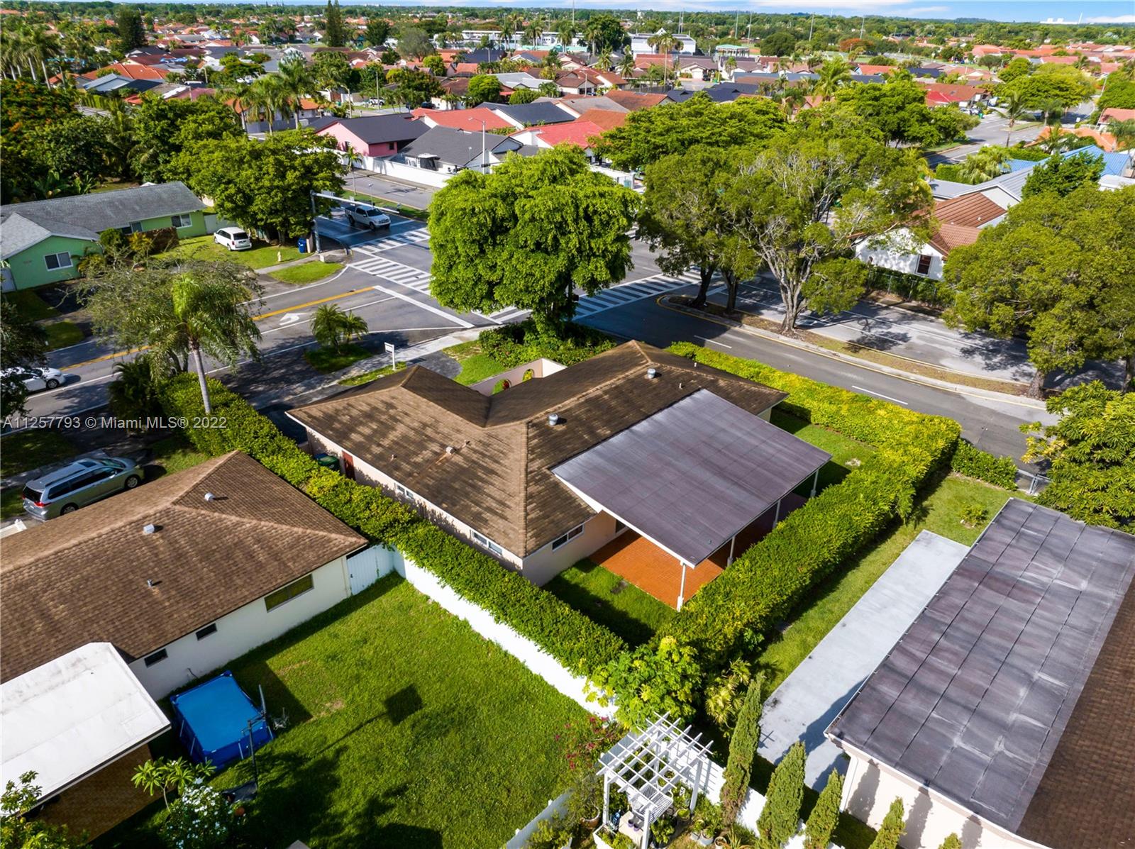 14121 Southwest 47th Street Miami, FL 33175 - Photo 42 of 45 an aerial view of a house with a garden