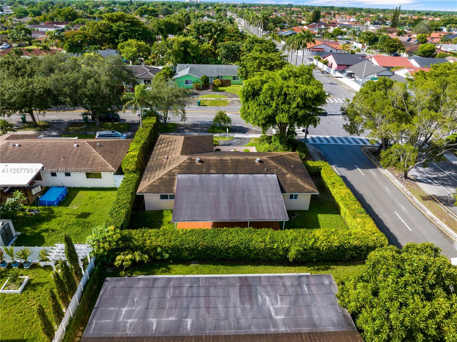 14121 Southwest 47th Street Miami, FL 33175 - Photo 43 of 45 an aerial view of a house with a yard basket ball court and outdoor seating