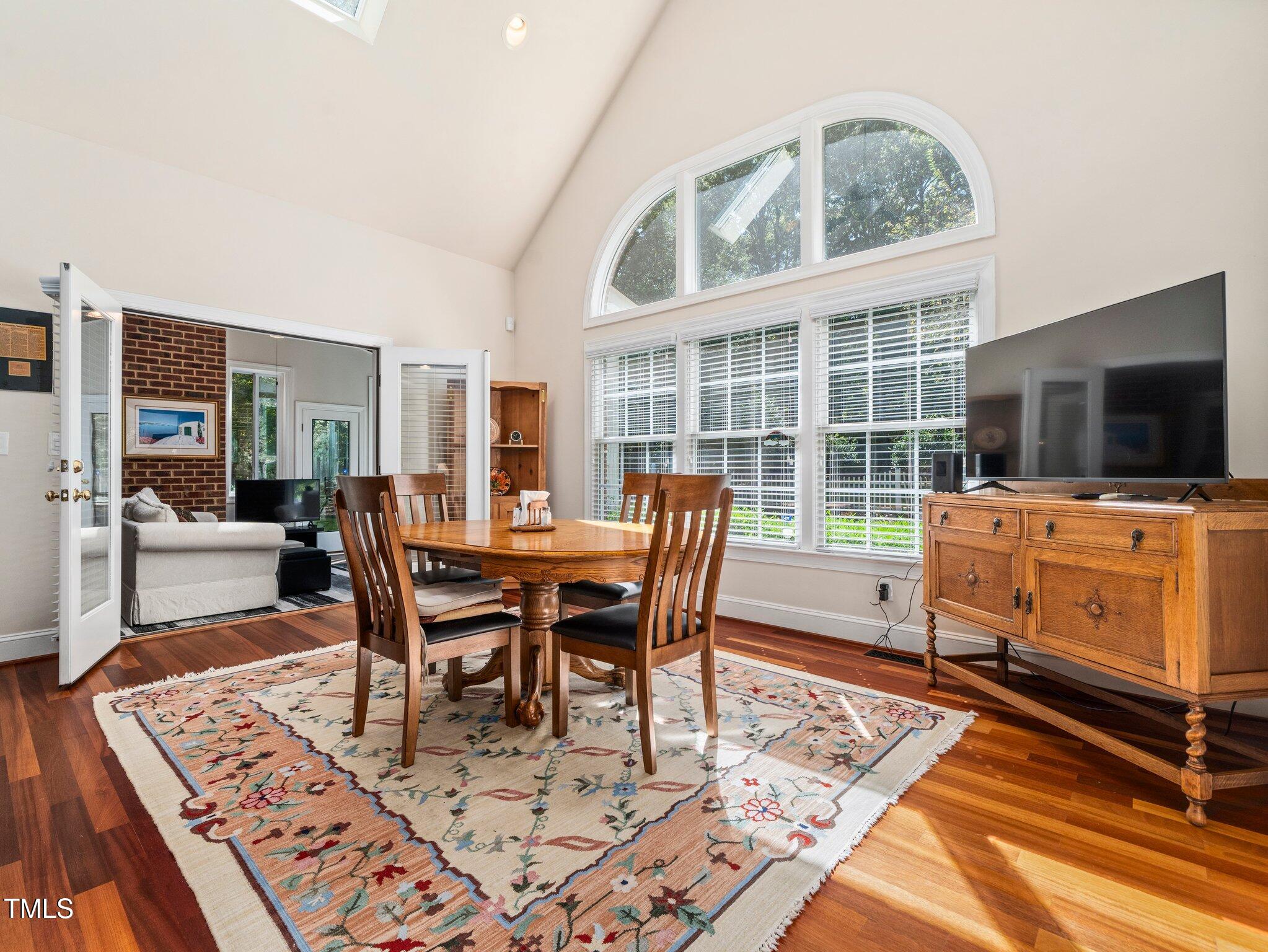 10937 Cahill Road Raleigh, NC 27614 - Photo 20 of 53 Spacious Breakfast Rm has Bank of Windows for Bright Atmosphere
