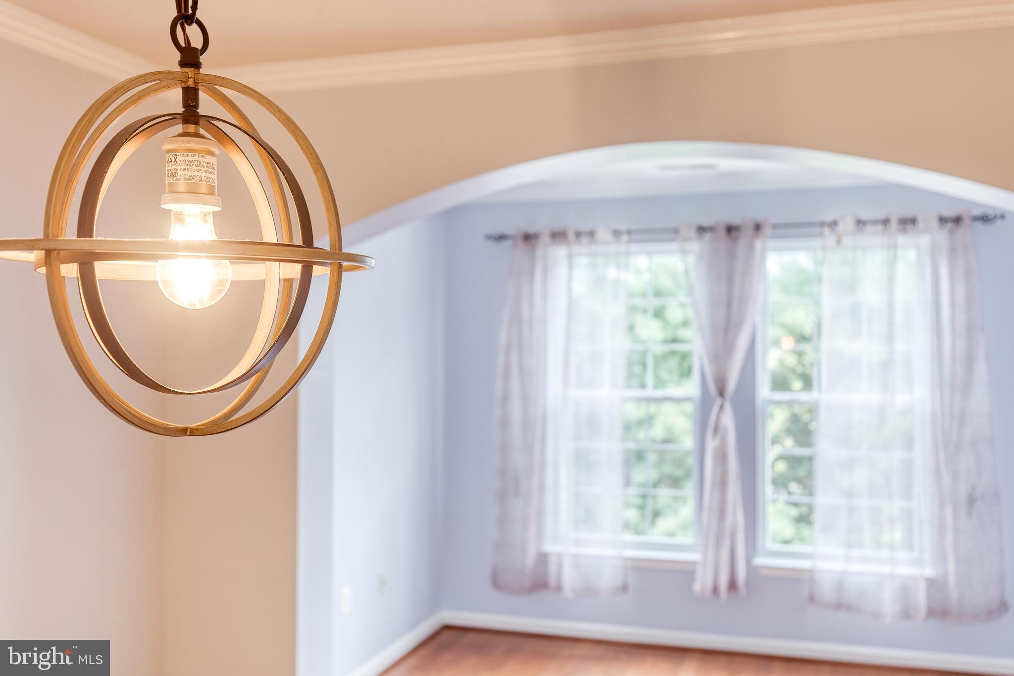 400 Symphony Circle, Unit 406 Hunt Valley, MD 21030 - Photo 18 of 37 a view of a entryway door with wooden floor