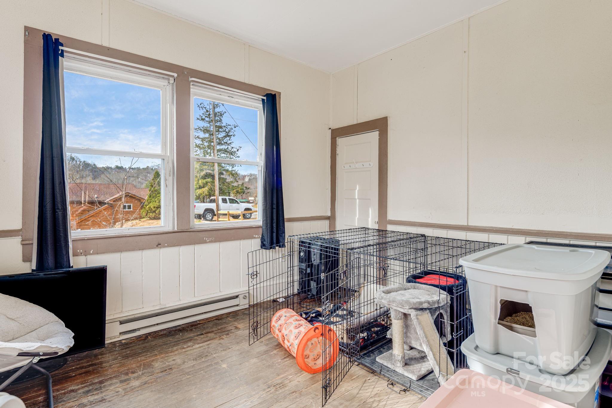 5454 Ela Road Whittier, NC 28789 - Photo 16 of 41 a storage room with furniture a rug and a window