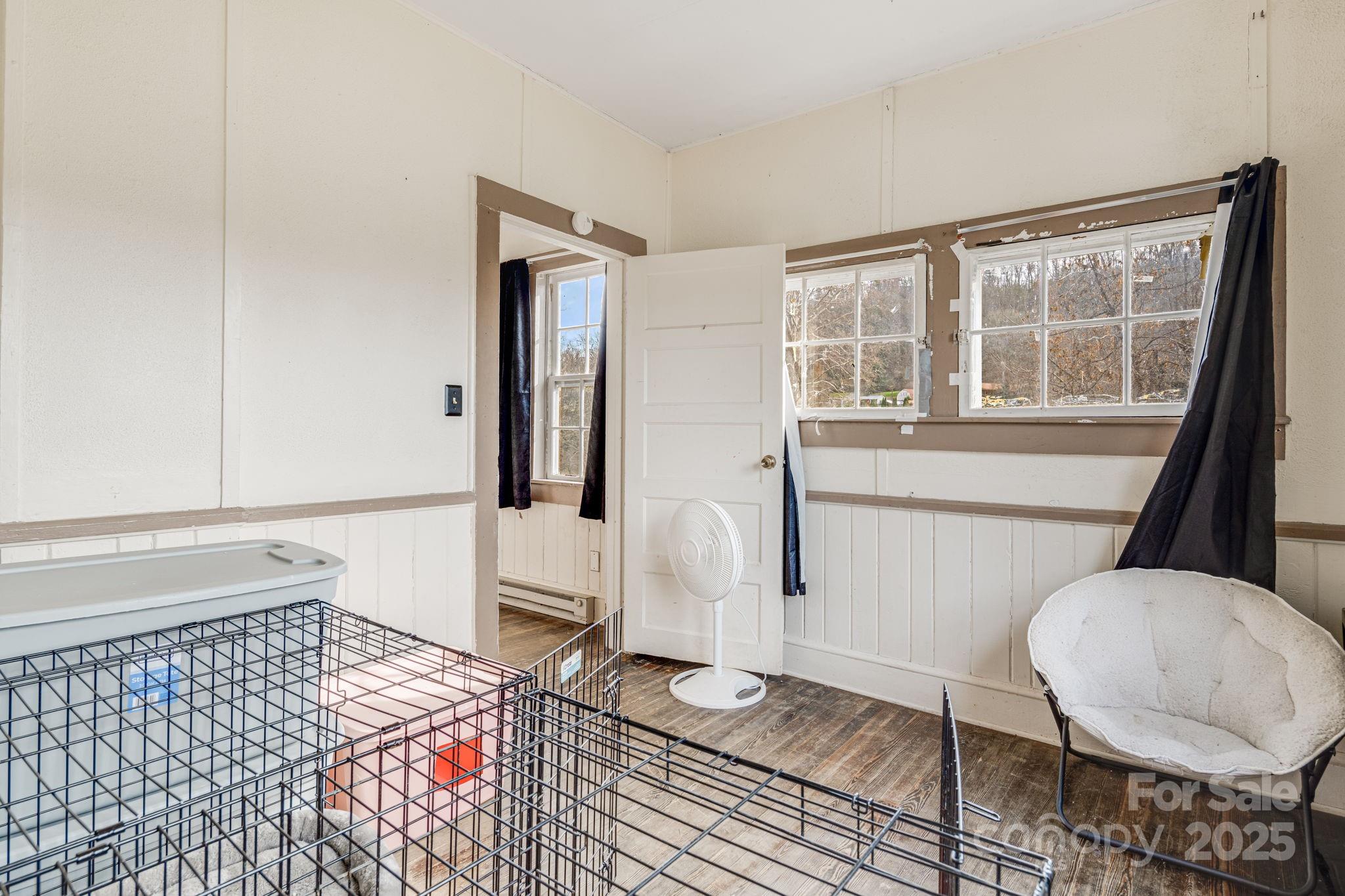 5454 Ela Road Whittier, NC 28789 - Photo 17 of 41 a living room with a couch and a table