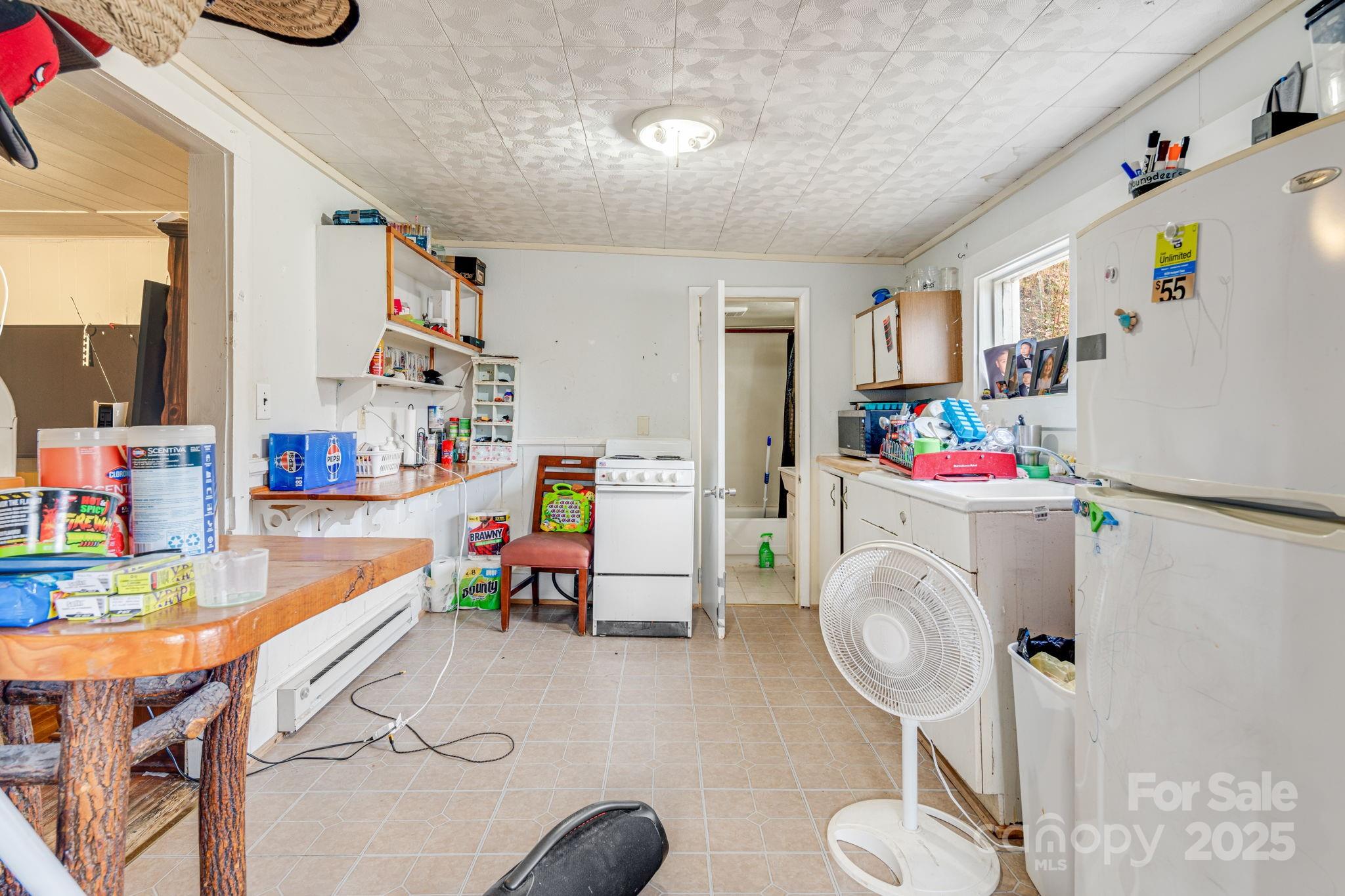 5454 Ela Road Whittier, NC 28789 - Photo 22 of 41 a storage room with furniture and toys