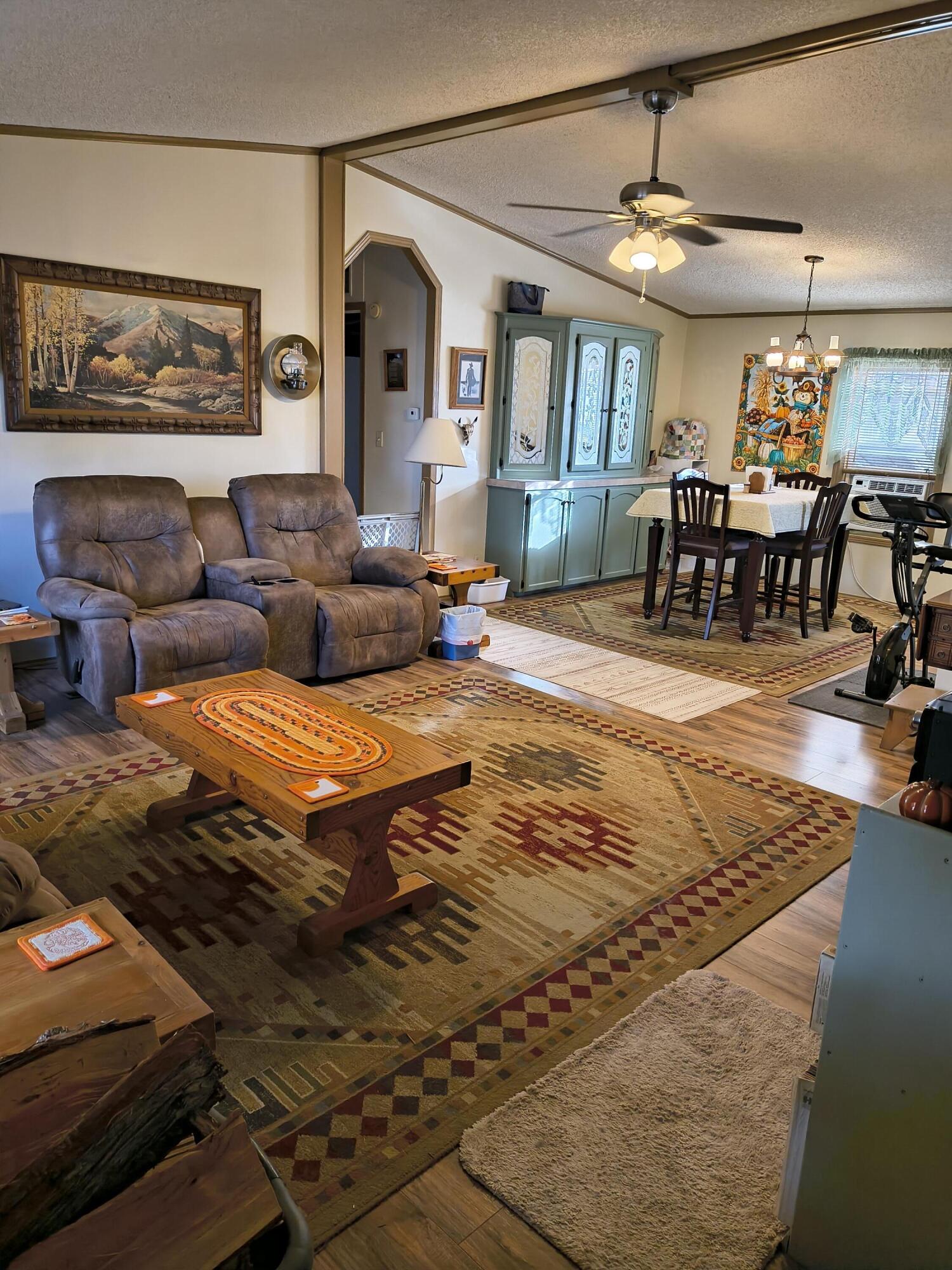 235 North Roosevelt Street Merrill, OR 97633 - Photo 4 of 27 a living room with furniture and a table