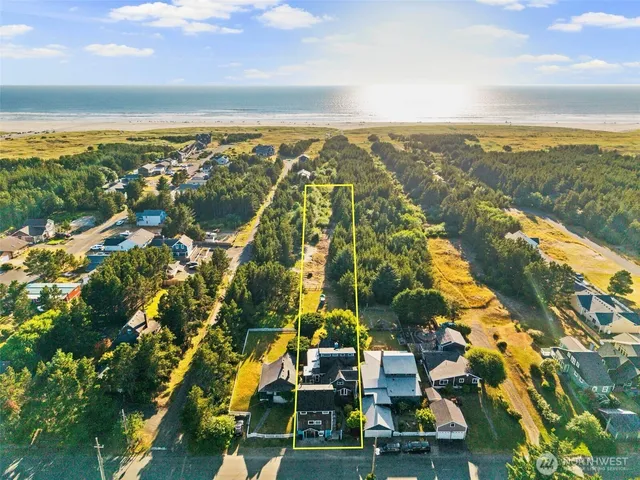 a view of a house with wooden deck