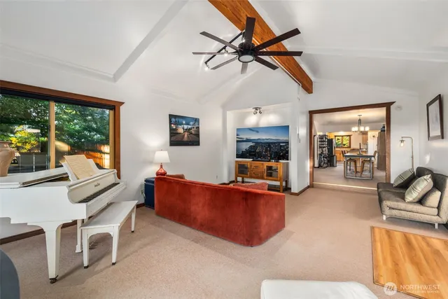 a view of a livingroom with furniture and window