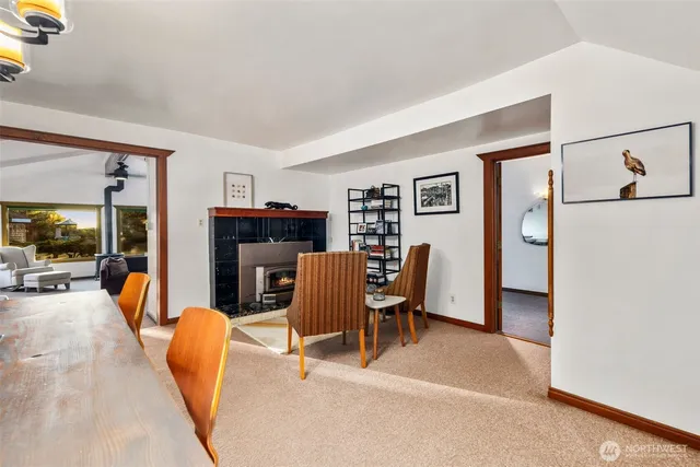 a kitchen with stainless steel appliances granite countertop a sink and cabinets next to a window