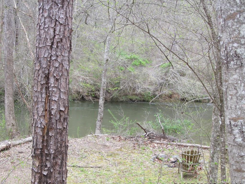 9 Destiny Dr Mill Spring Mill Spring, NC 28756 - Photo 12 of 13 a view of a lake with a large trees