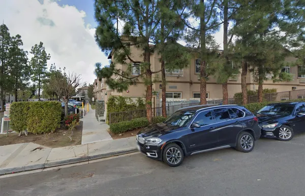 a car parked in front of a house