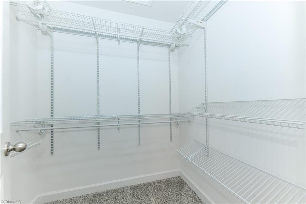158 Falling Brook Road Stokesdale, NC 27357 - Photo 17 of 30 Primary walk-in Closet