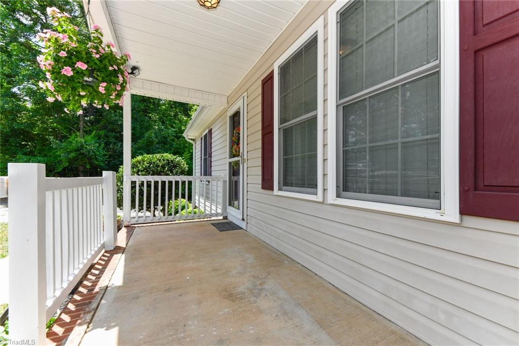 158 Falling Brook Road Stokesdale, NC 27357 - Photo 4 of 30 covered porch
