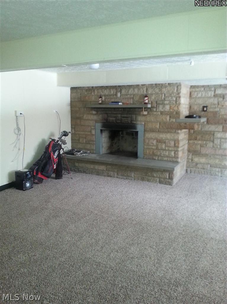 5895 Renninger Road Akron, OH 44319 - Photo 14 of 16 Fireplace in Rec Room