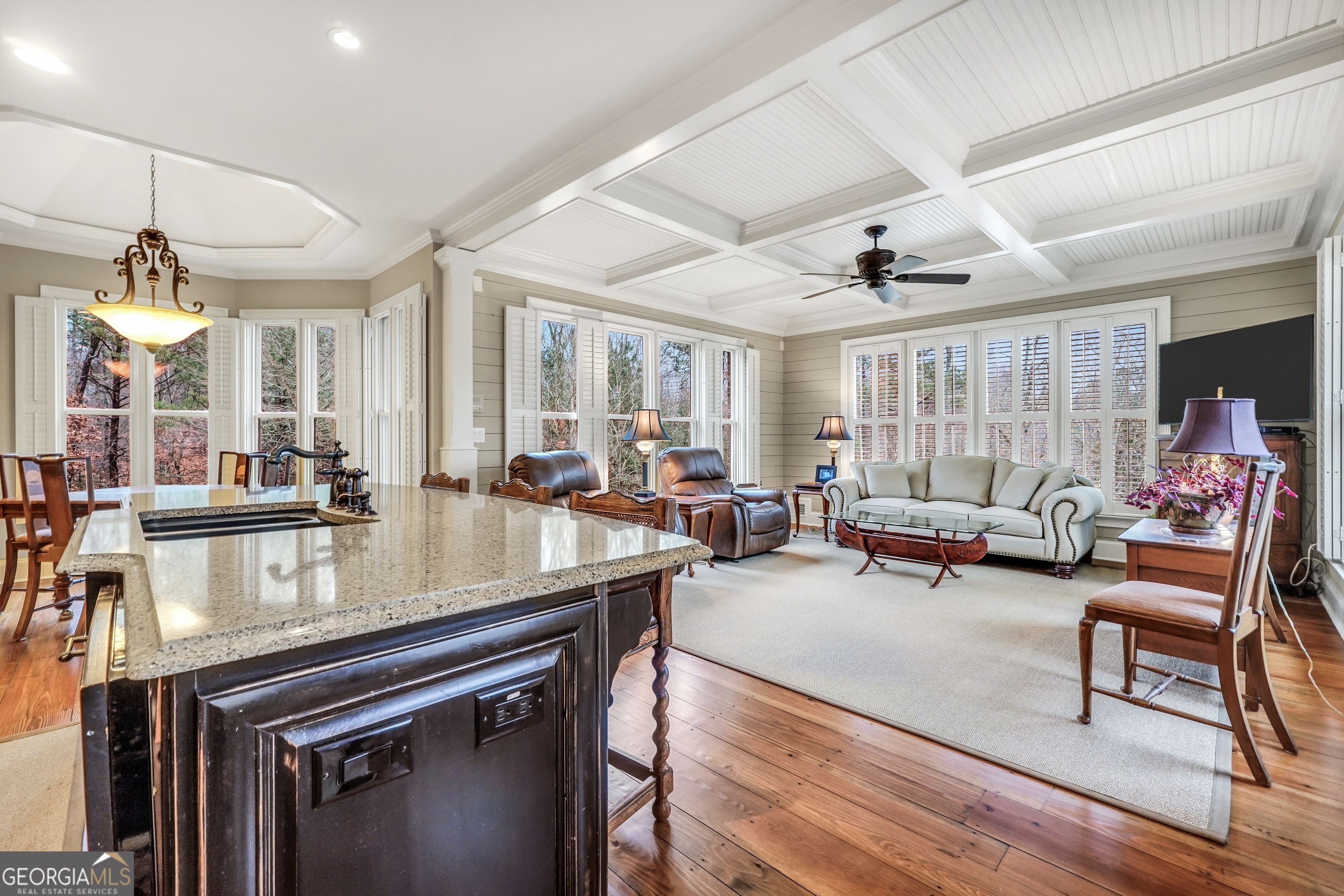 610 Elliott Road McDonough, GA 30252 - Photo 17 of 92 a view of a dining room with furniture window and wooden floor