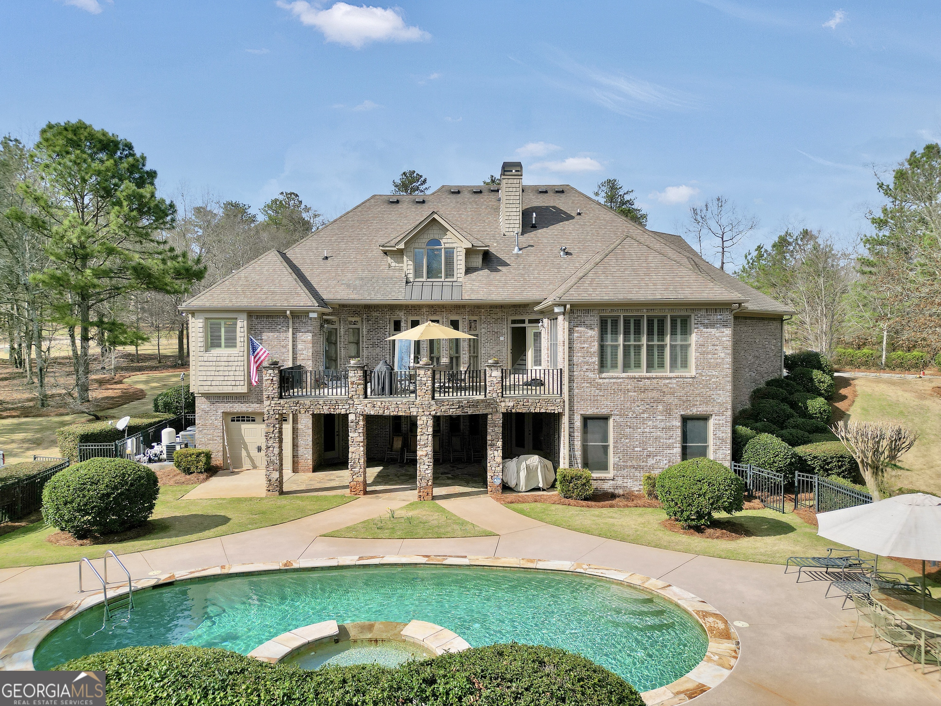 610 Elliott Road McDonough, GA 30252 - Photo 2 of 92 a front view of a house with a yard table and chairs