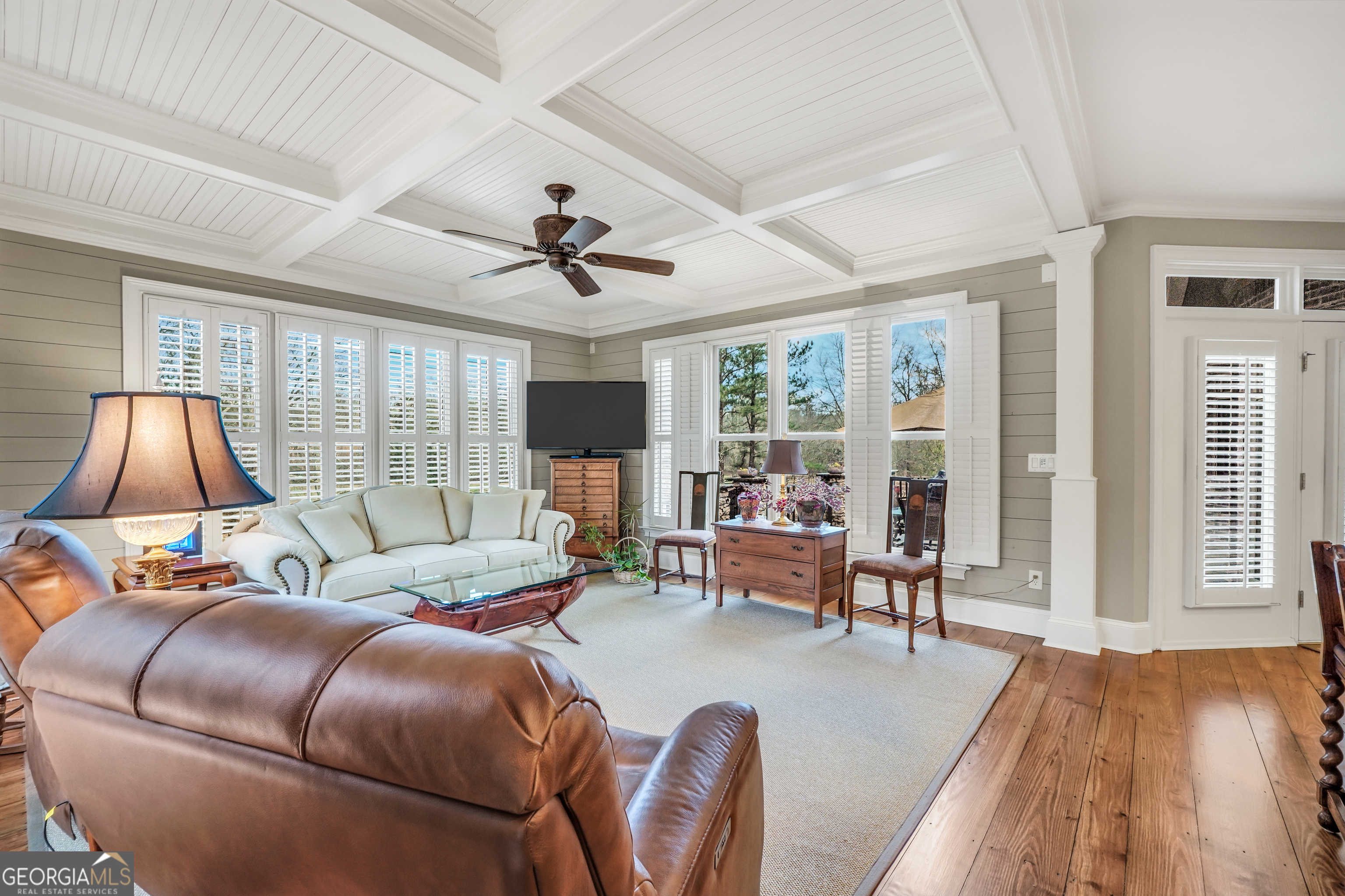 610 Elliott Road McDonough, GA 30252 - Photo 24 of 92 a bedroom with a large bed and a flat screen tv
