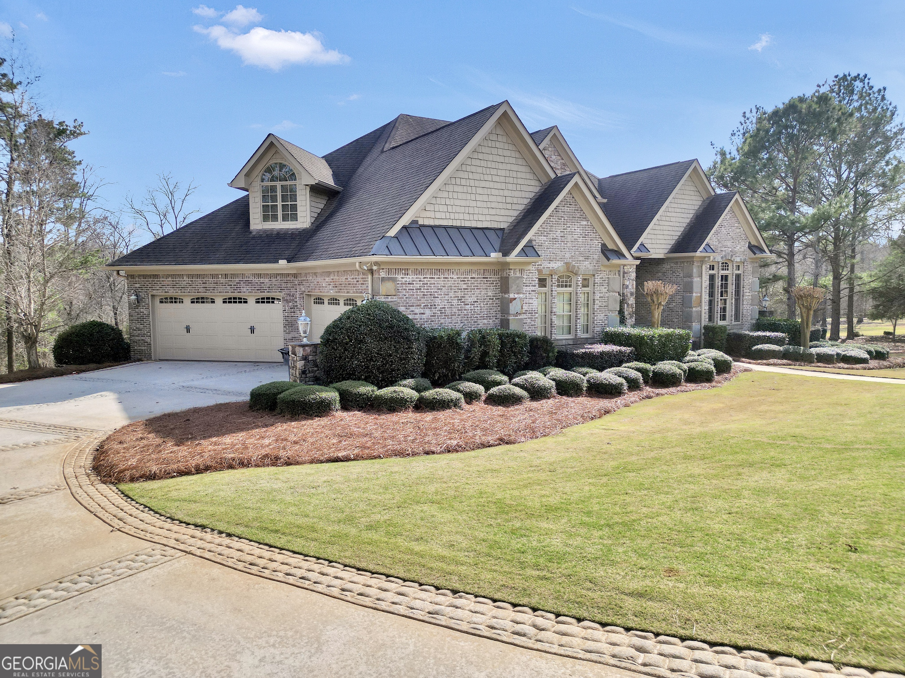610 Elliott Road McDonough, GA 30252 - Photo 3 of 92 a front view of a house with a yard