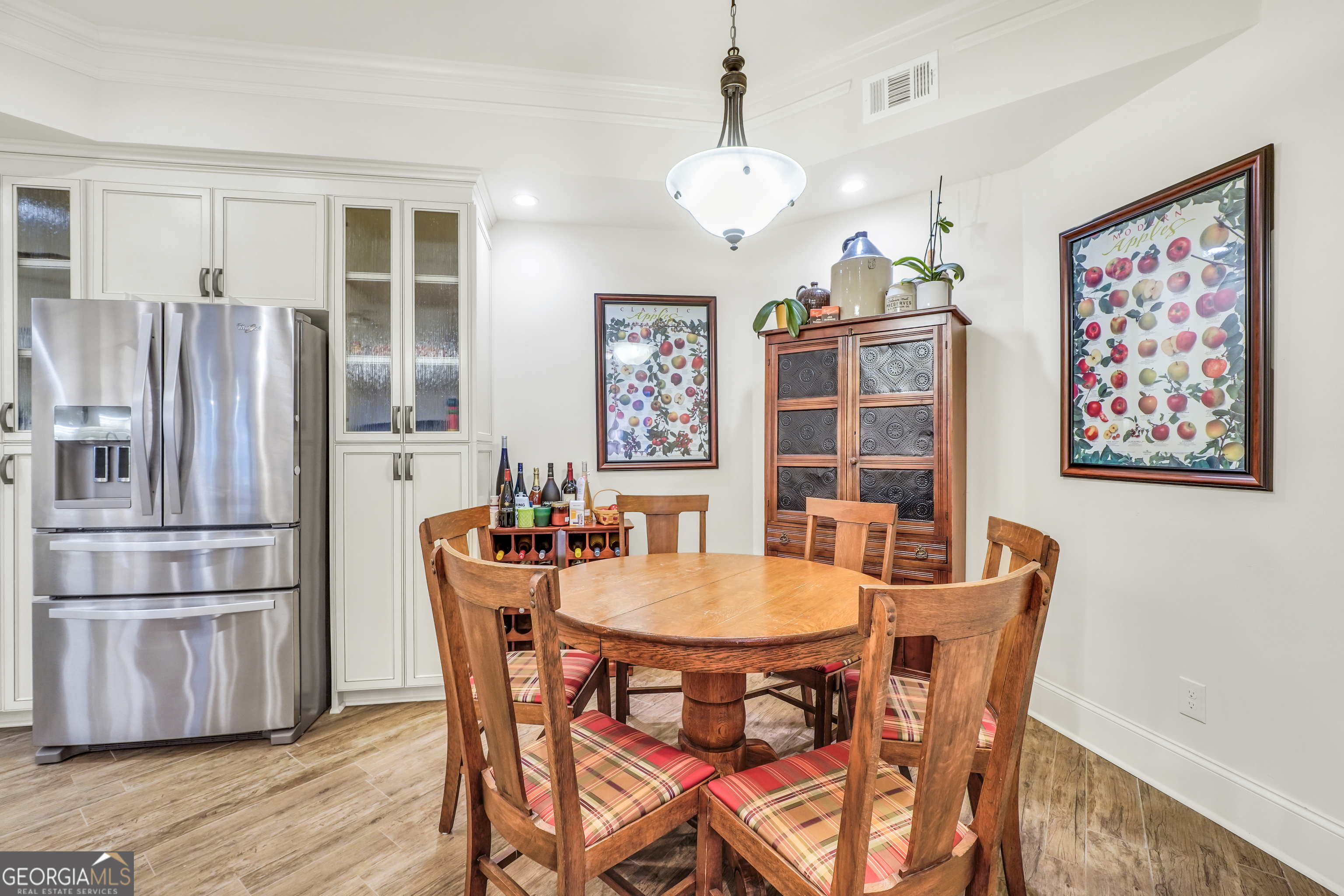 610 Elliott Road McDonough, GA 30252 - Photo 61 of 92 a view of a dining room with furniture window and wooden floor