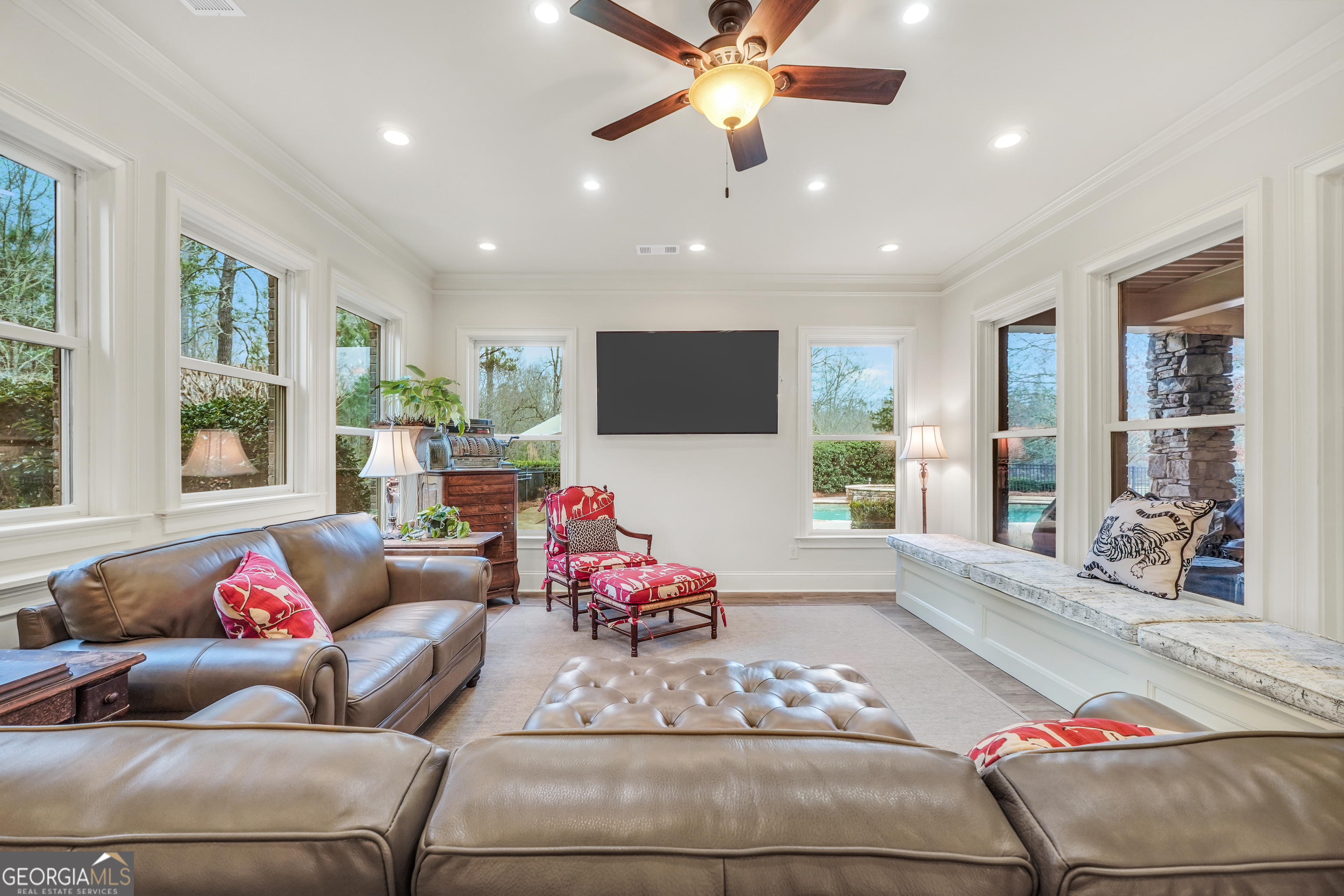 610 Elliott Road McDonough, GA 30252 - Photo 62 of 92 a living room with furniture and a flat screen tv