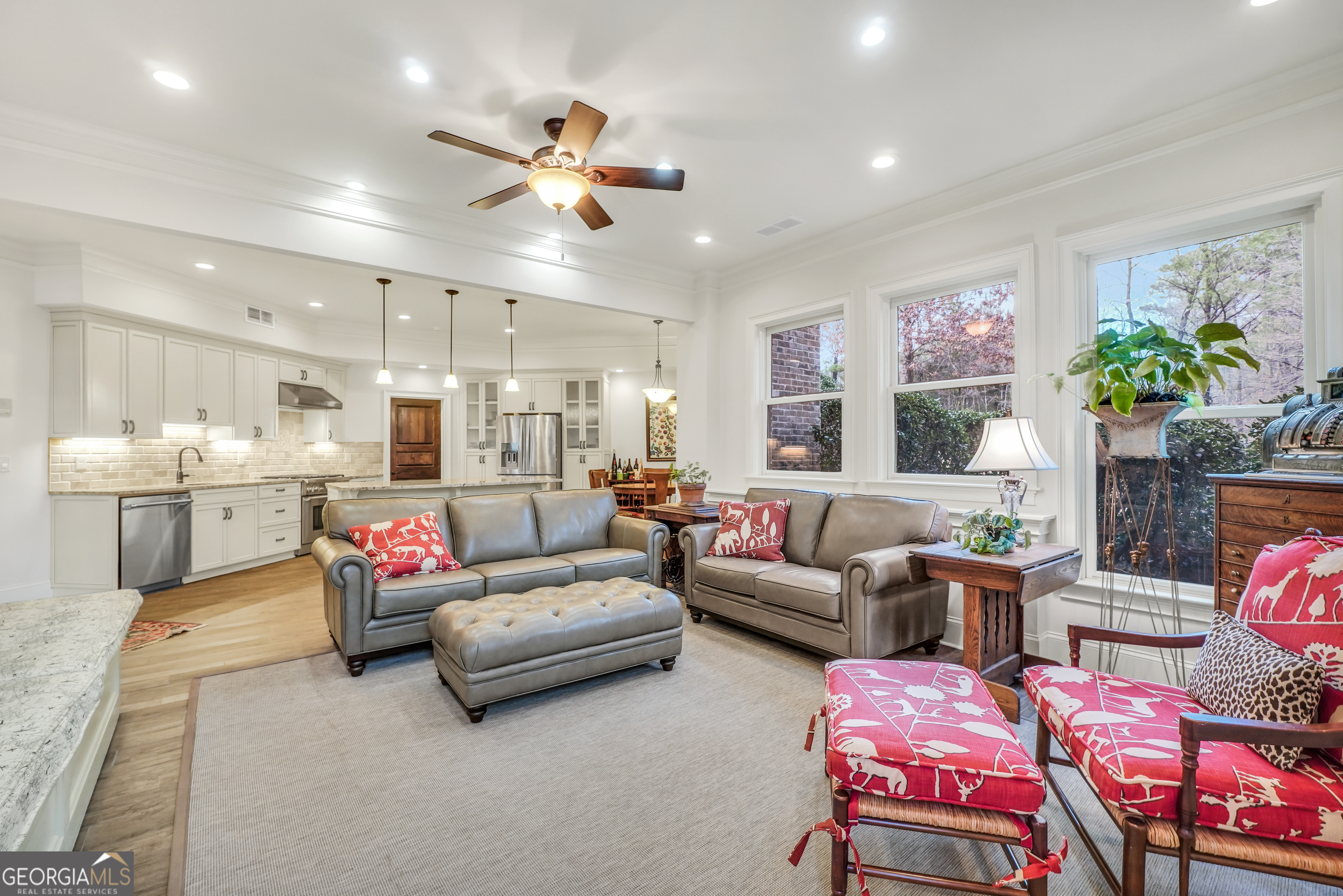 610 Elliott Road McDonough, GA 30252 - Photo 64 of 92 a living room with furniture kitchen view and a potted plant