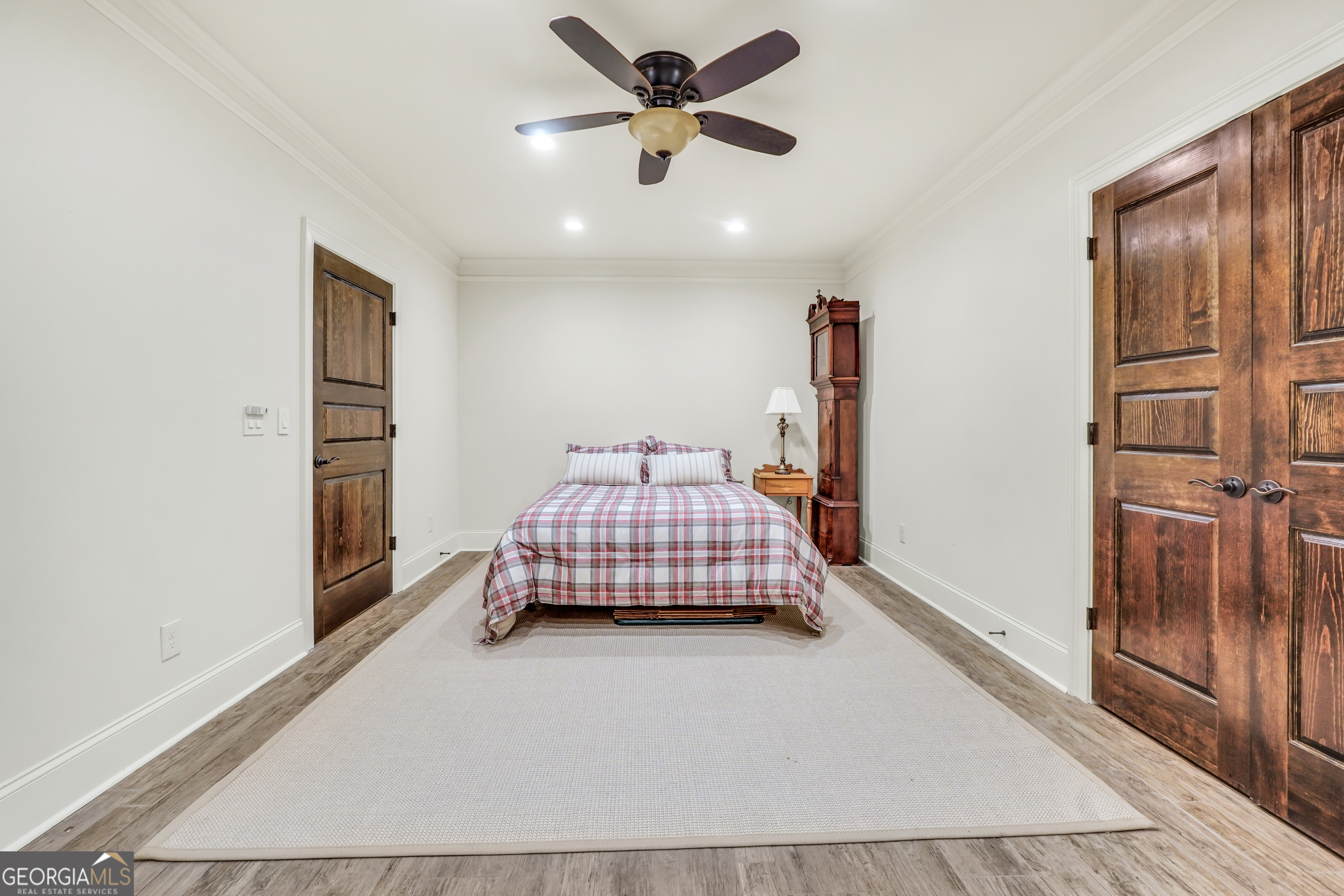 610 Elliott Road McDonough, GA 30252 - Photo 70 of 92 a bedroom with a bed and a refrigerator