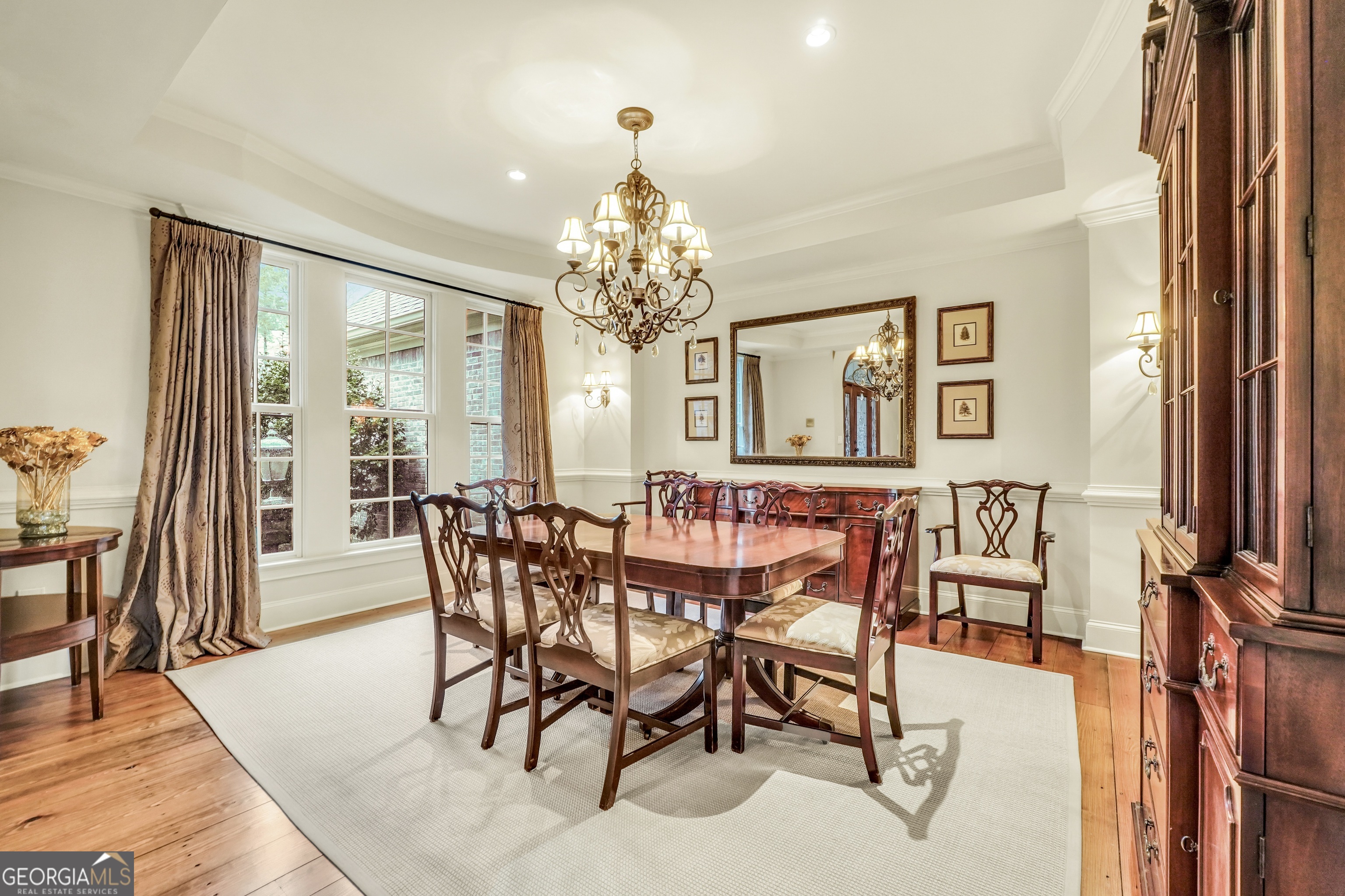 610 Elliott Road McDonough, GA 30252 - Photo 9 of 92 a view of a dining room with furniture window and wooden floor