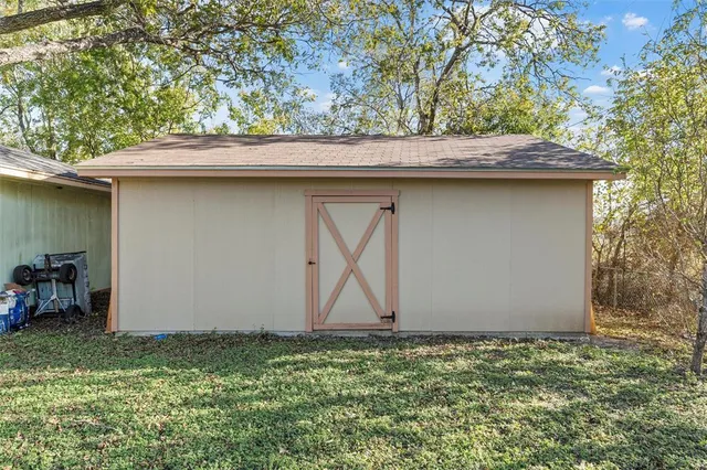 a backyard of a house with lots of green space