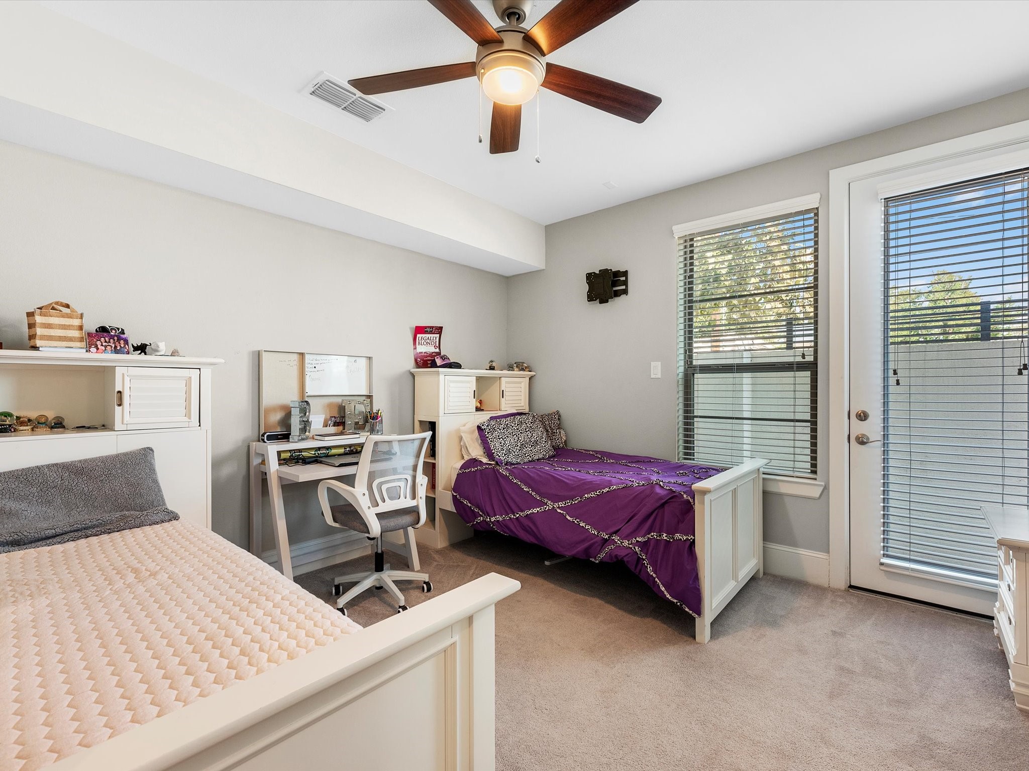 5467 Larkin Street Houston, TX 77007 - Photo 5 of 33 a bedroom with a bed and a desk
