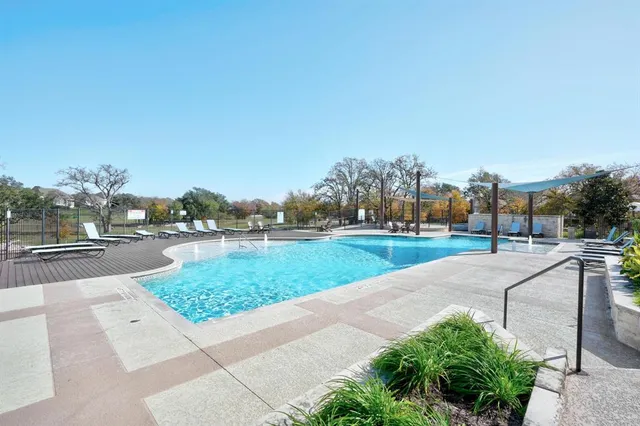 a view of a street with a yard