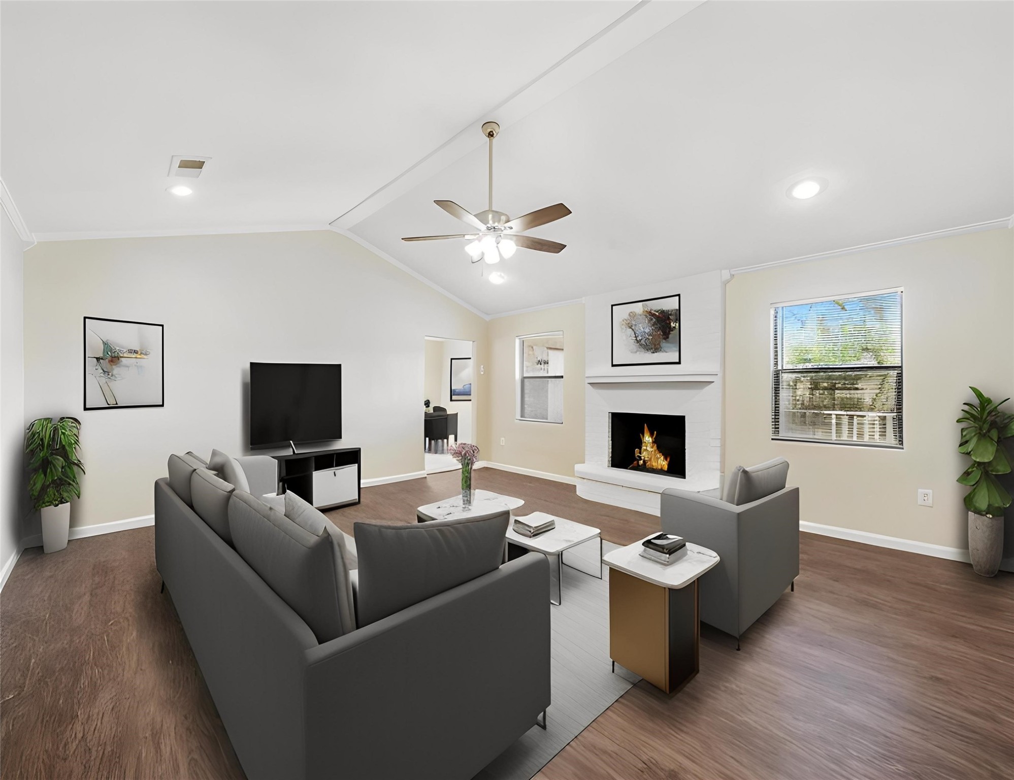 3806 Montego Drive Baytown, TX 77521 - Photo 2 of 19 a living room with furniture a fireplace and a flat screen tv