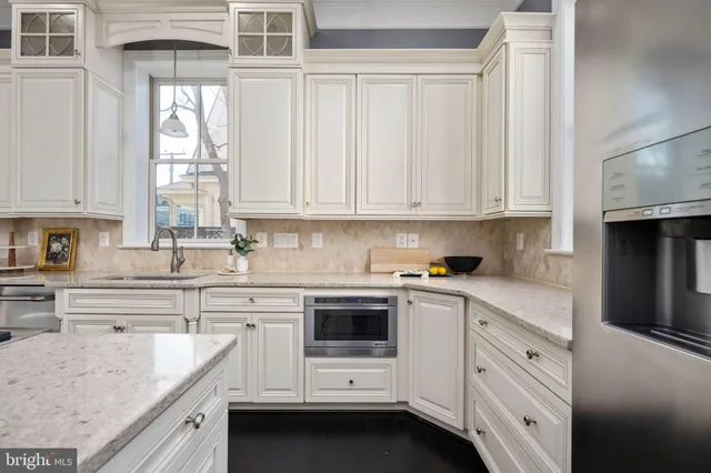 a view of entryway with wooden floor and stairs