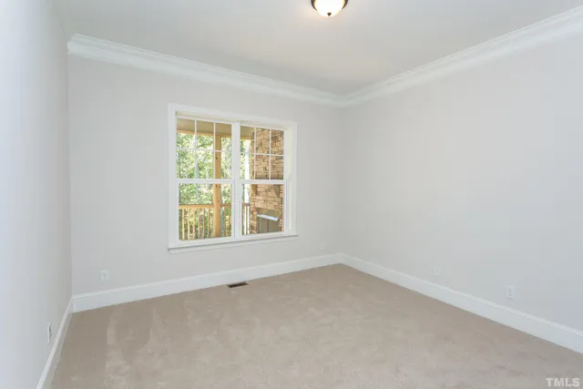 a view of a balcony with wooden floor