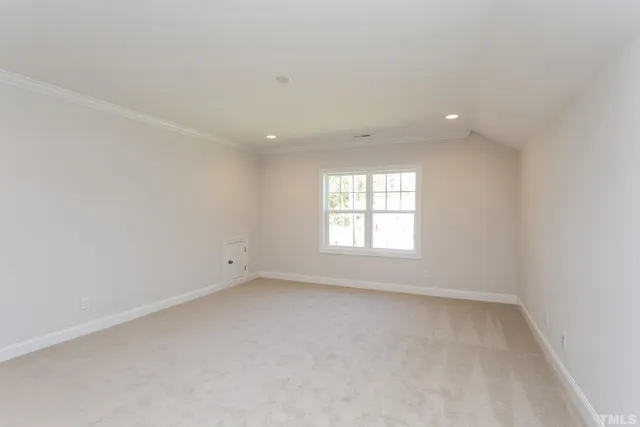 a view of a wooden deck and a yard