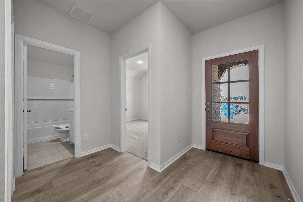 533 Hickory Rdg Drive Van Alstyne, TX 75495 - Photo 7 of 31 wooden floor and closet in a room