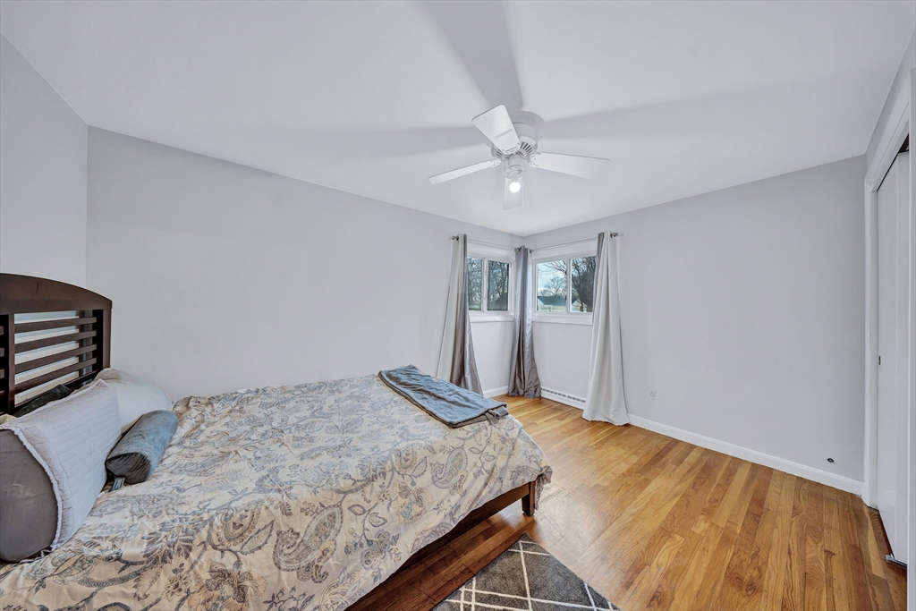 6 Woodward Road Framingham, MA 01701 - Photo 19 of 41 a bed sitting in a spacious bedroom next to a window
