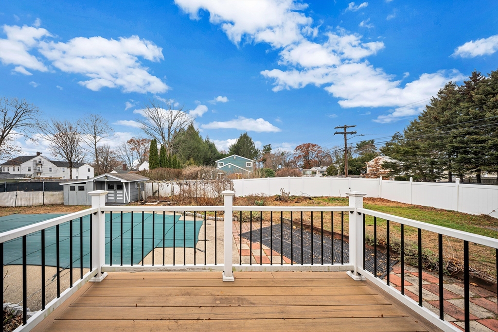 6 Woodward Road Framingham, MA 01701 - Photo 27 of 41 a view of a balcony with wooden fence