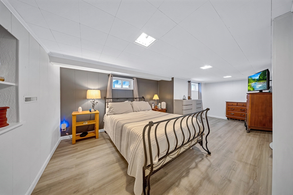 6 Woodward Road Framingham, MA 01701 - Photo 33 of 41 a spacious bedroom with a bed and a desk