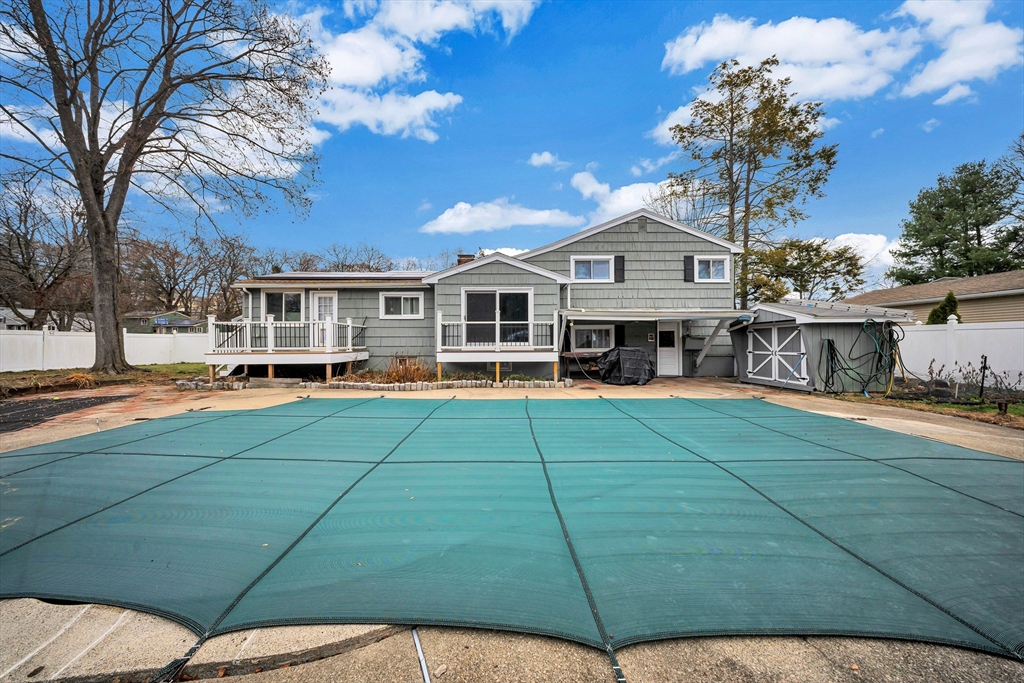 6 Woodward Road Framingham, MA 01701 - Photo 37 of 41 a front view of a house with a garden