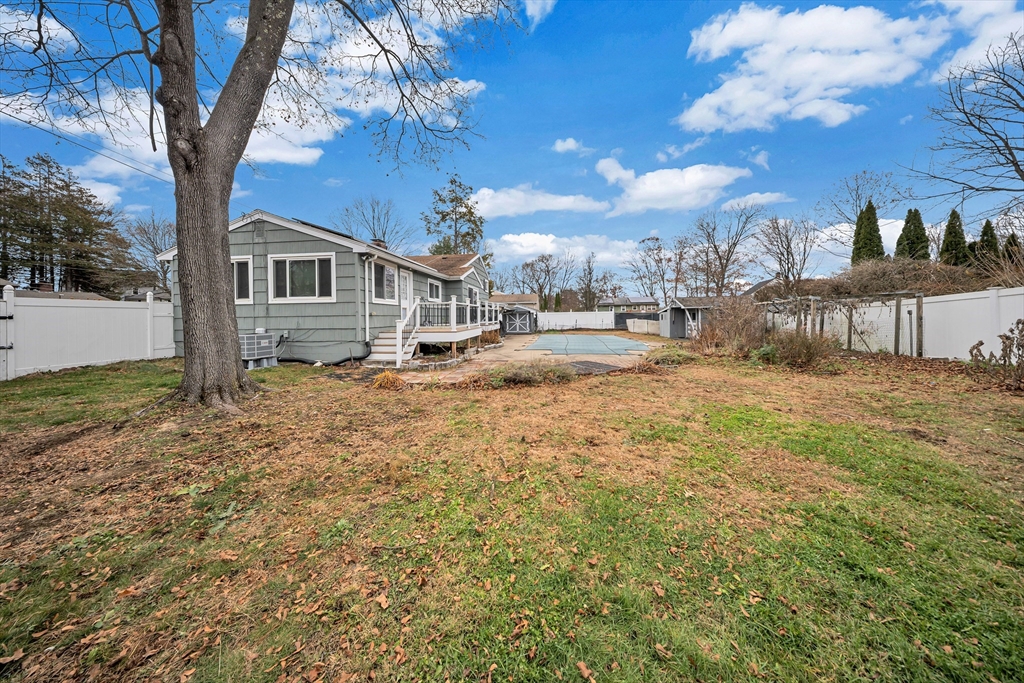 6 Woodward Road Framingham, MA 01701 - Photo 41 of 41 a view of a house with a yard covered in snow